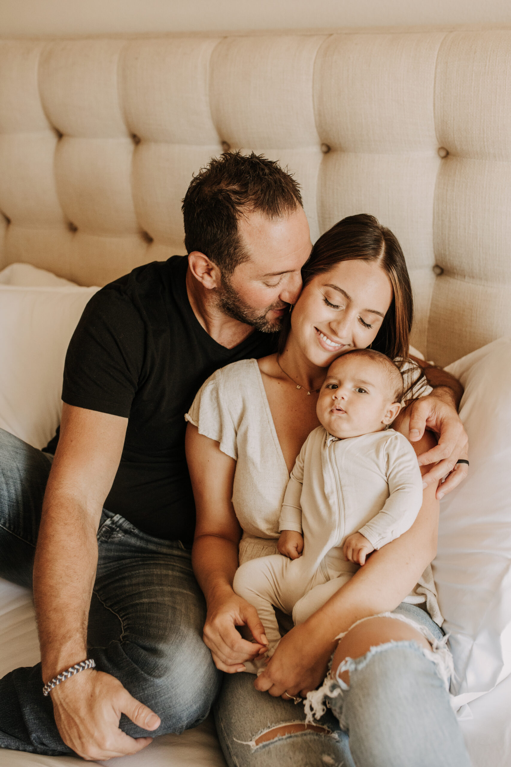 warm toned tan beige in home newborn baby photos family photos newborn baby new mom and dad San Diego family photographer Sabrina kinsella sabrinalynnphoto