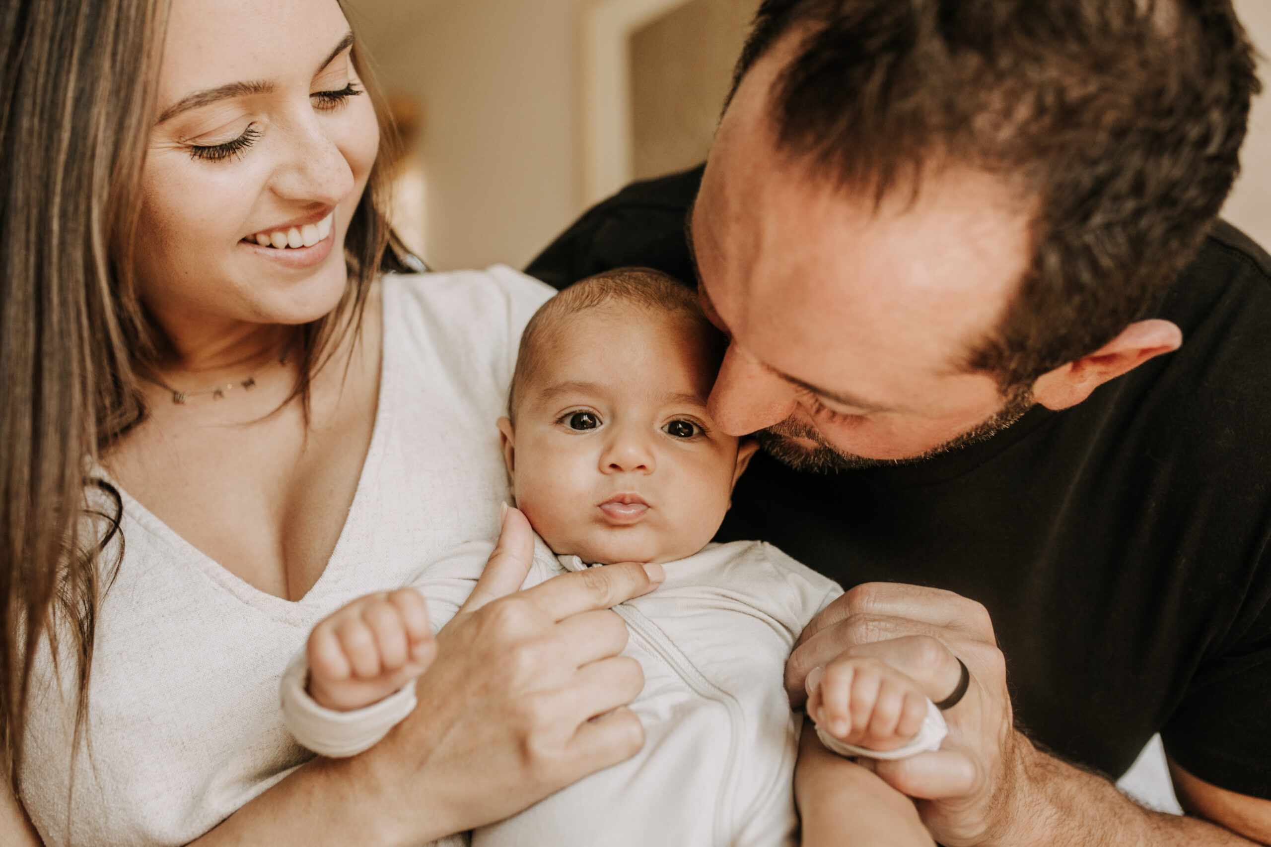 warm toned tan beige in home newborn baby photos family photos newborn baby new mom and dad San Diego family photographer Sabrina kinsella sabrinalynnphoto