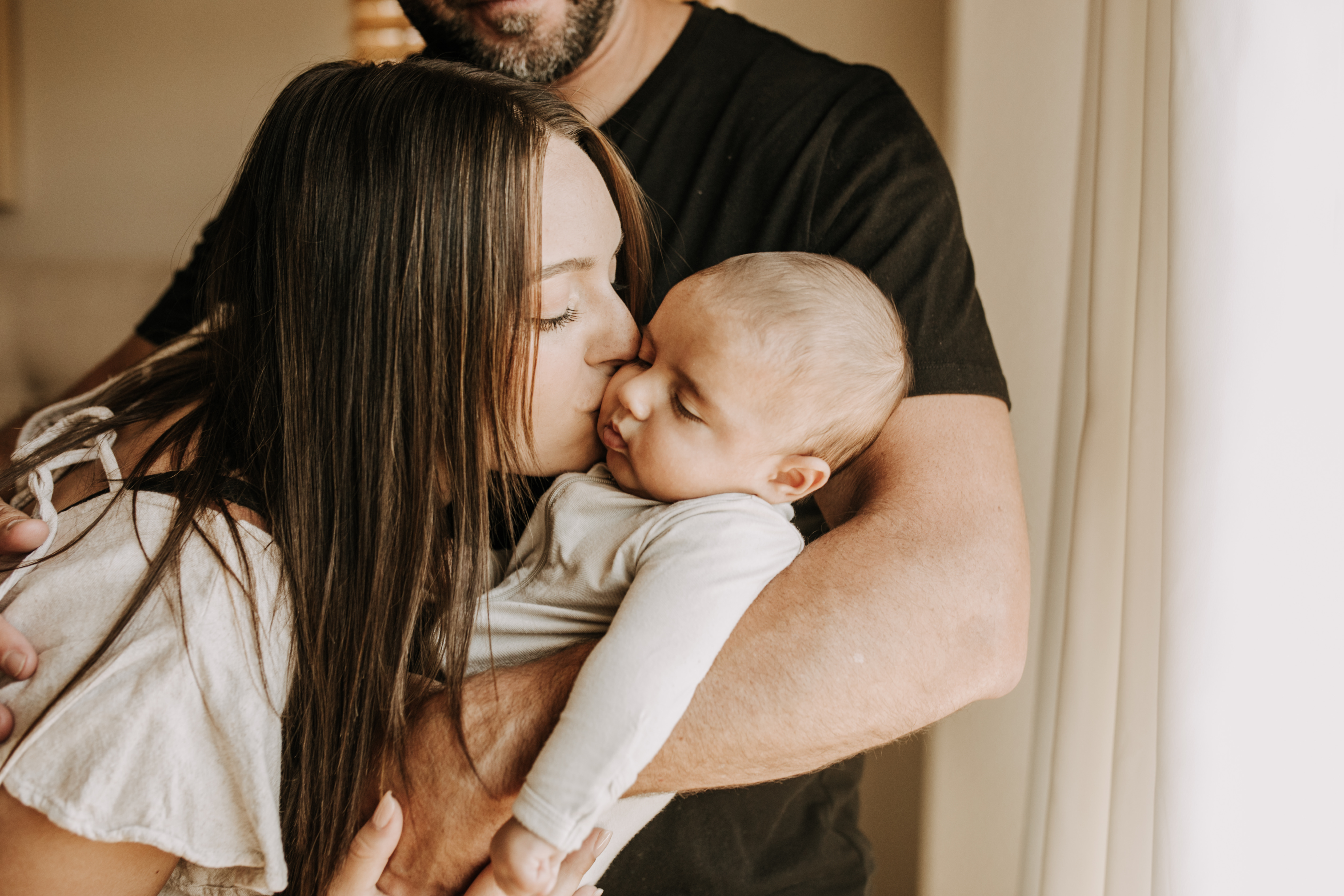 warm toned tan beige in home newborn baby photos family photos newborn baby new mom and dad San Diego family photographer Sabrina kinsella sabrinalynnphoto