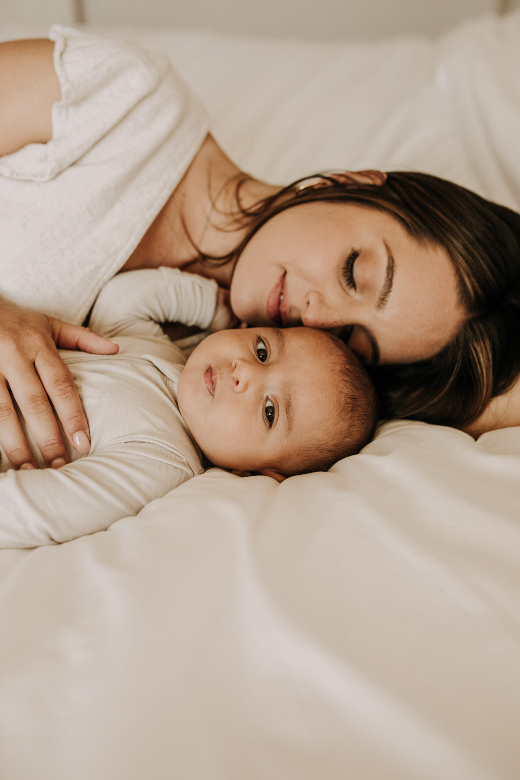 warm toned tan beige in home newborn baby photos family photos newborn baby new mom and dad San Diego family photographer Sabrina kinsella sabrinalynnphoto