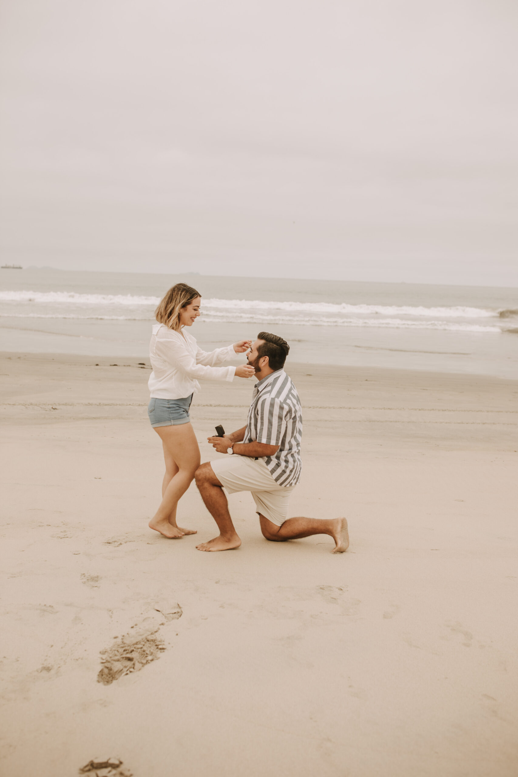 engagement photos San Diego couples photographer surprise proposal engagement couples beach photos romantic beach photos San Diego photographer Sabrina Kinsella