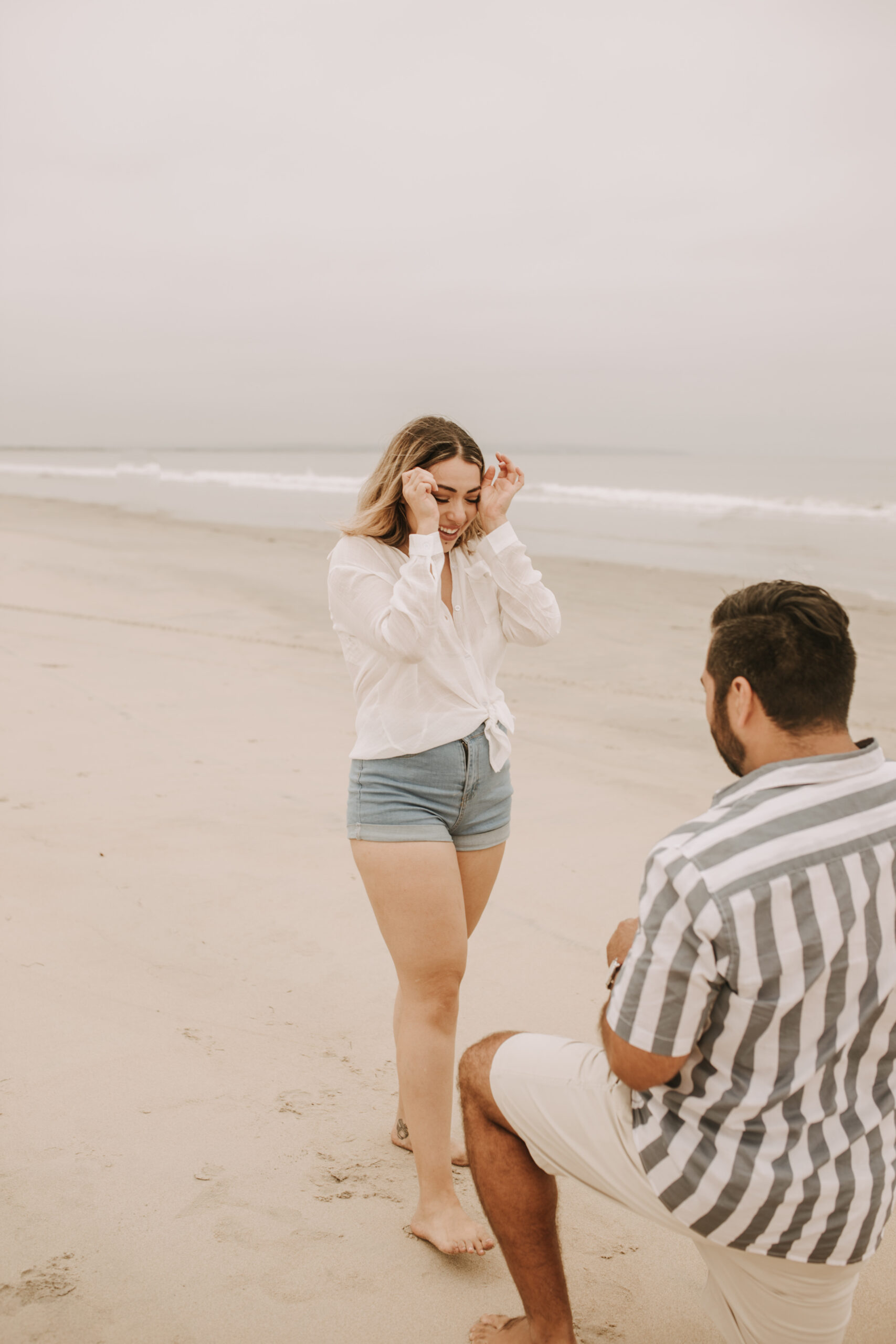 engagement photos San Diego couples photographer surprise proposal engagement couples beach photos romantic beach photos San Diego photographer Sabrina Kinsella