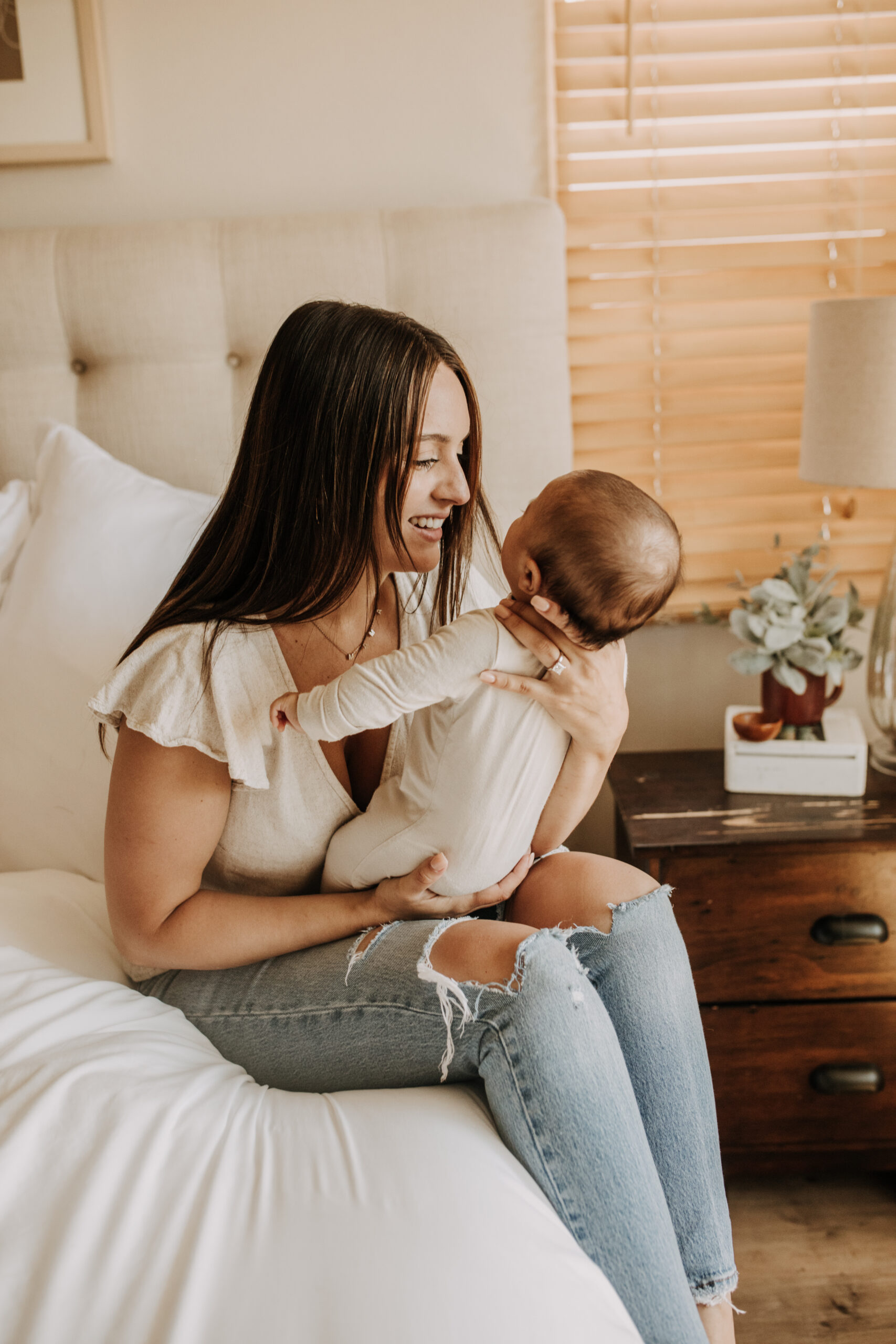 warm toned tan beige in home newborn baby photos family photos newborn baby new mom and dad San Diego family photographer Sabrina kinsella sabrinalynnphoto