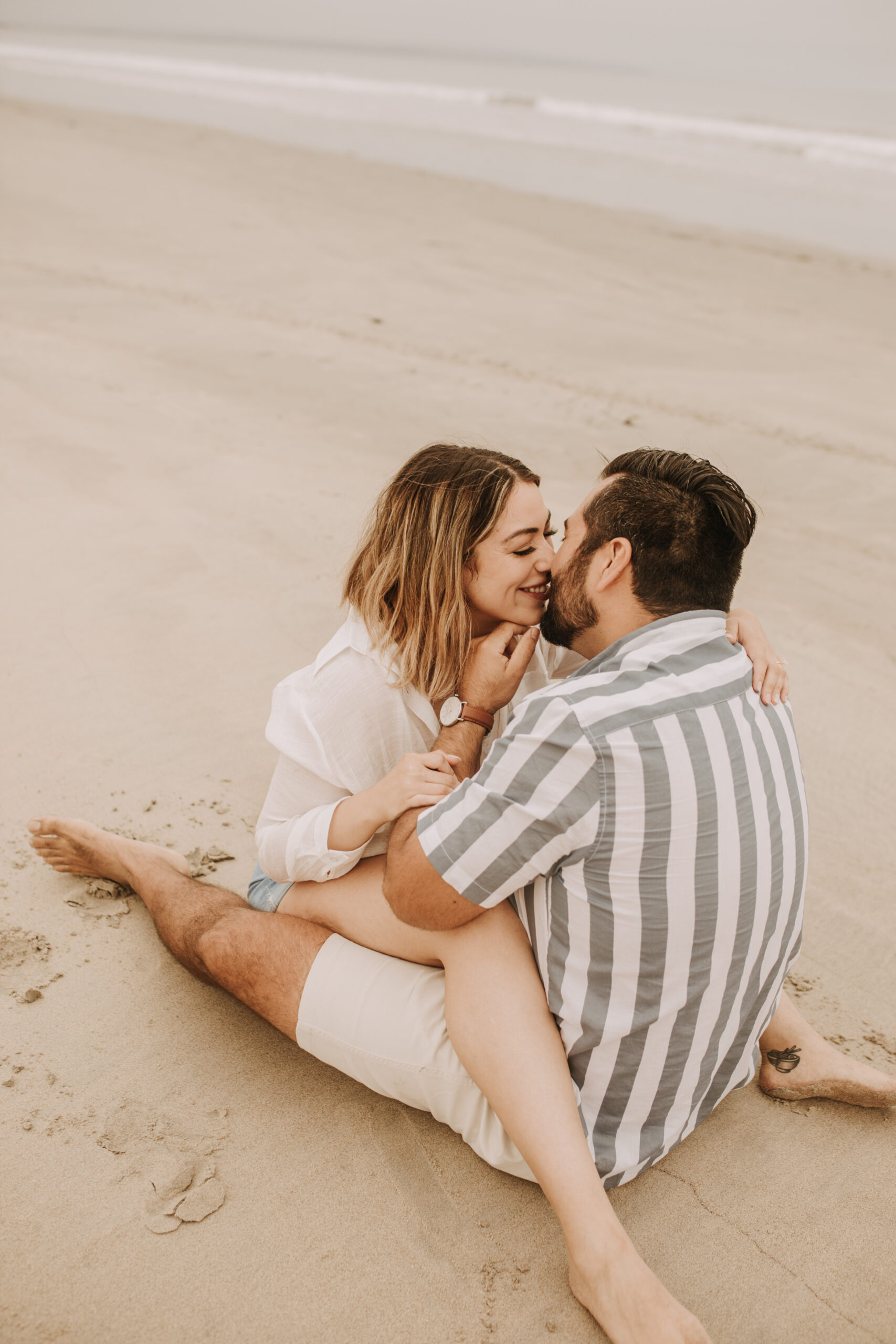 engagement photos San Diego couples photographer surprise proposal engagement couples beach photos romantic beach photos San Diego photographer Sabrina Kinsella