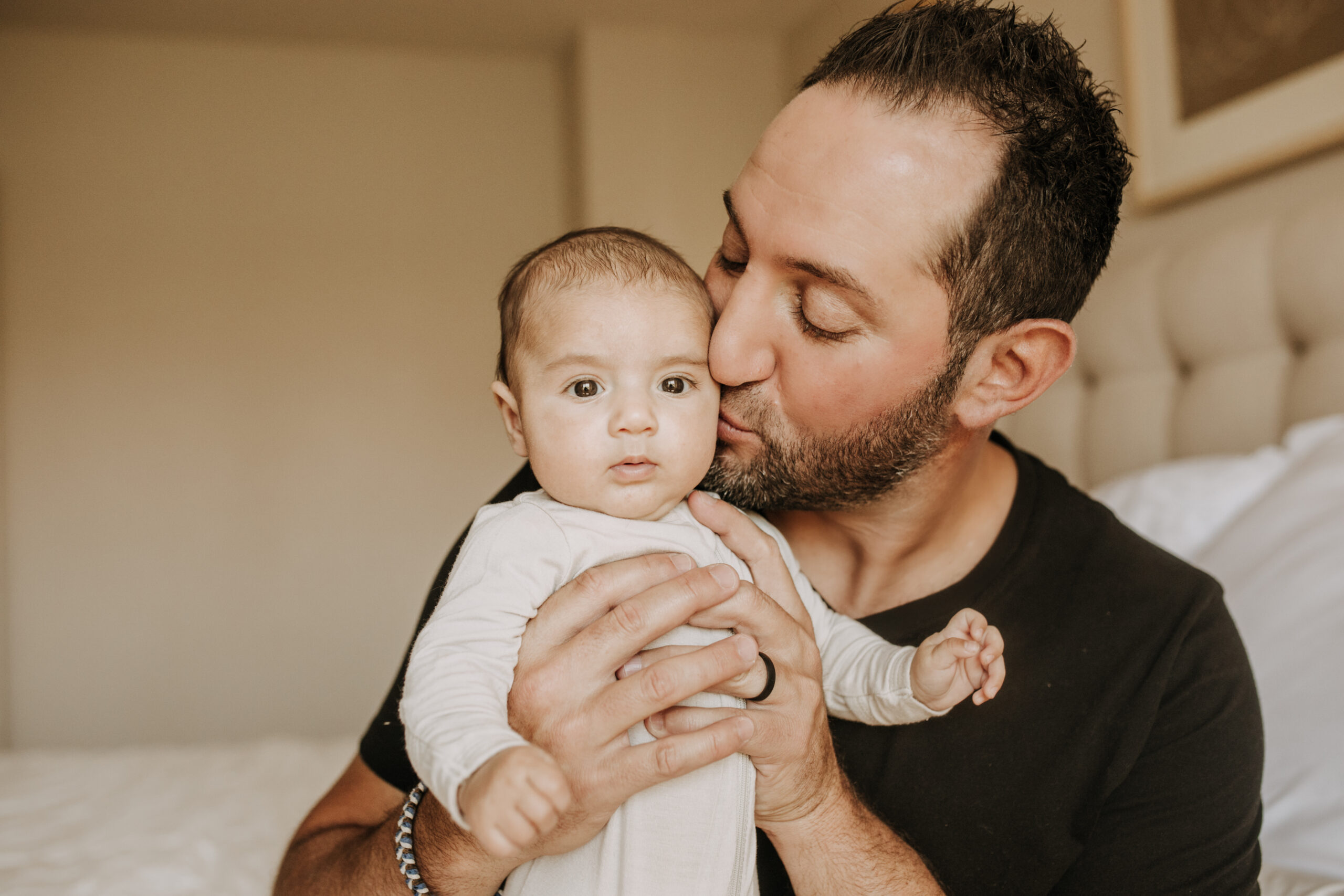 warm toned tan beige in home newborn baby photos family photos newborn baby new mom and dad San Diego family photographer Sabrina kinsella sabrinalynnphoto