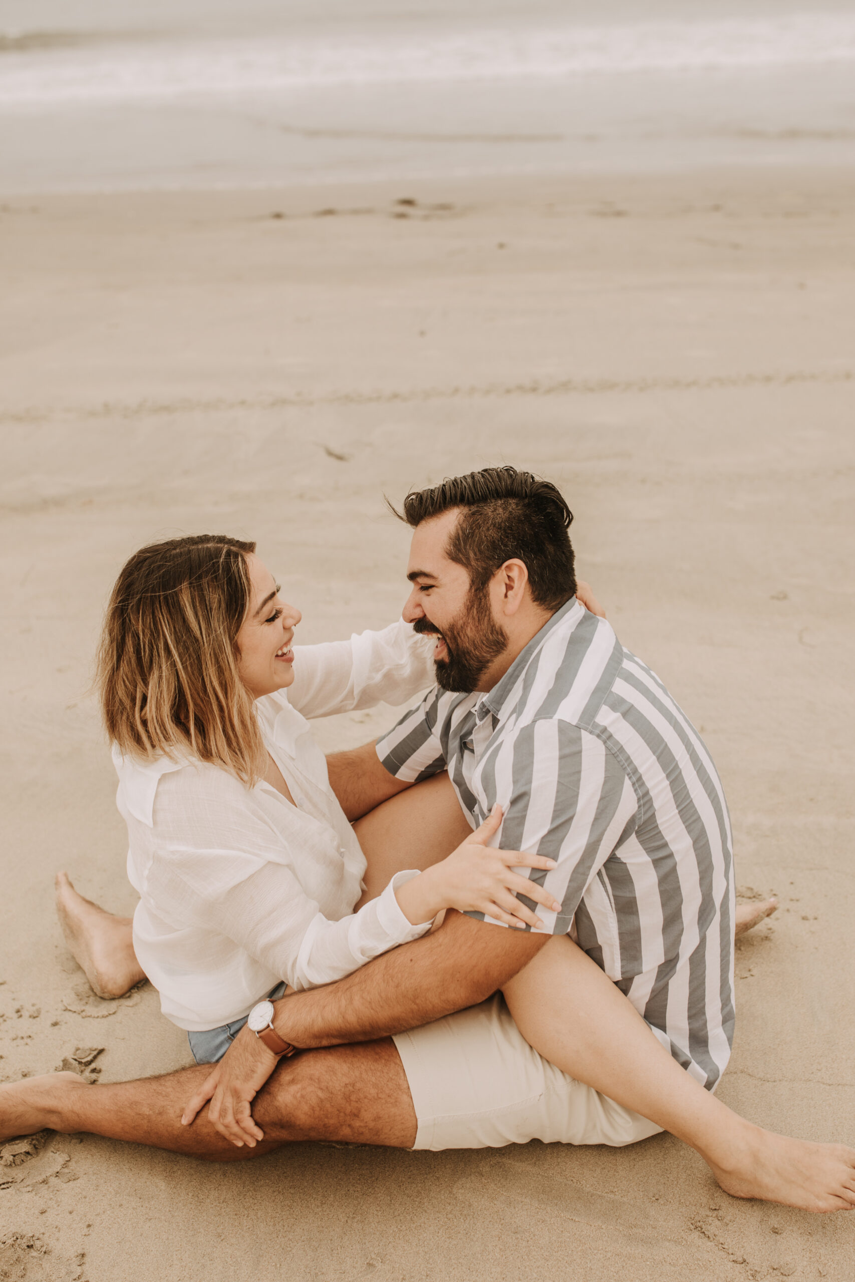 engagement photos San Diego couples photographer surprise proposal engagement couples beach photos romantic beach photos San Diego photographer Sabrina Kinsella