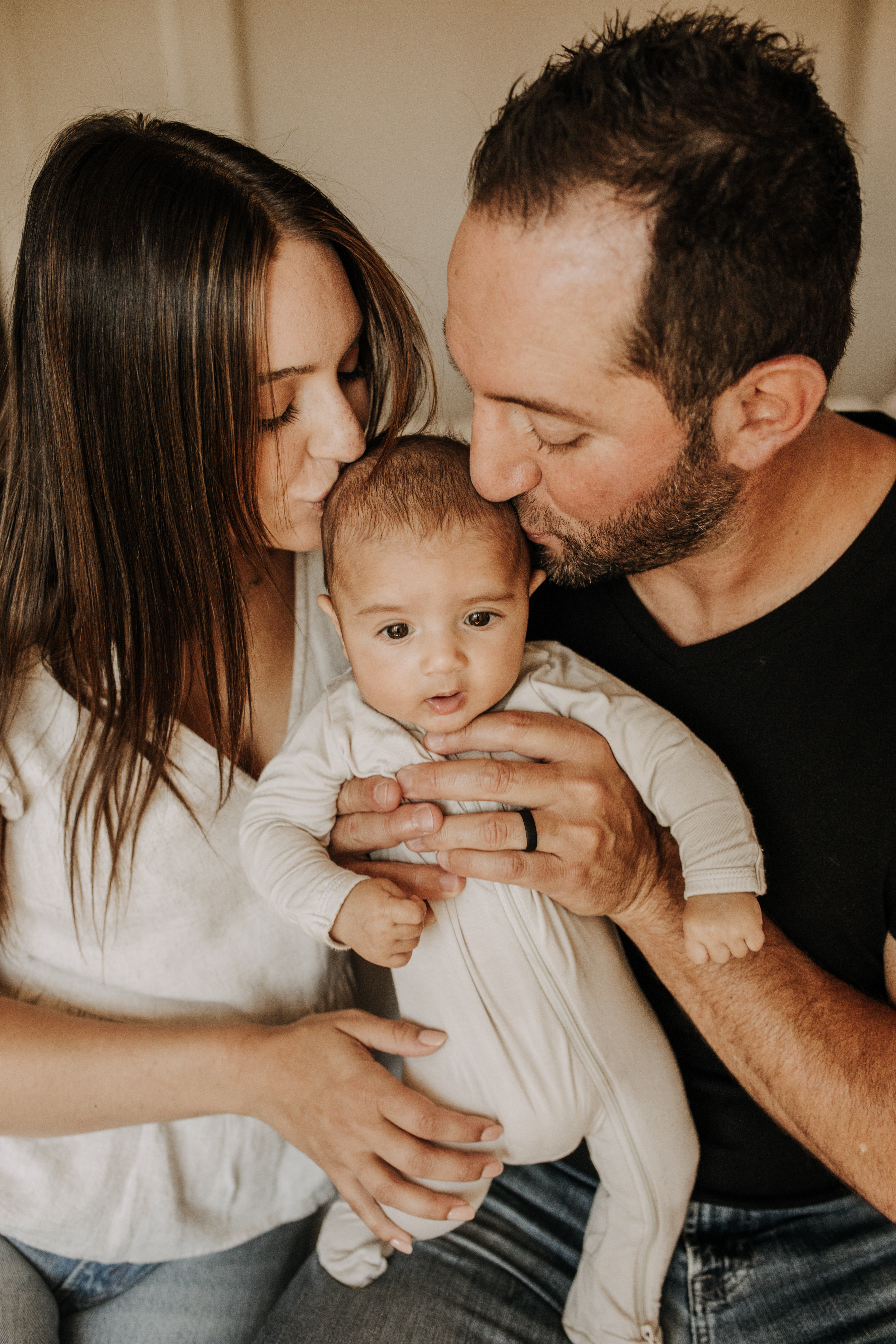 warm toned tan beige in home newborn baby photos family photos newborn baby new mom and dad San Diego family photographer Sabrina kinsella sabrinalynnphoto