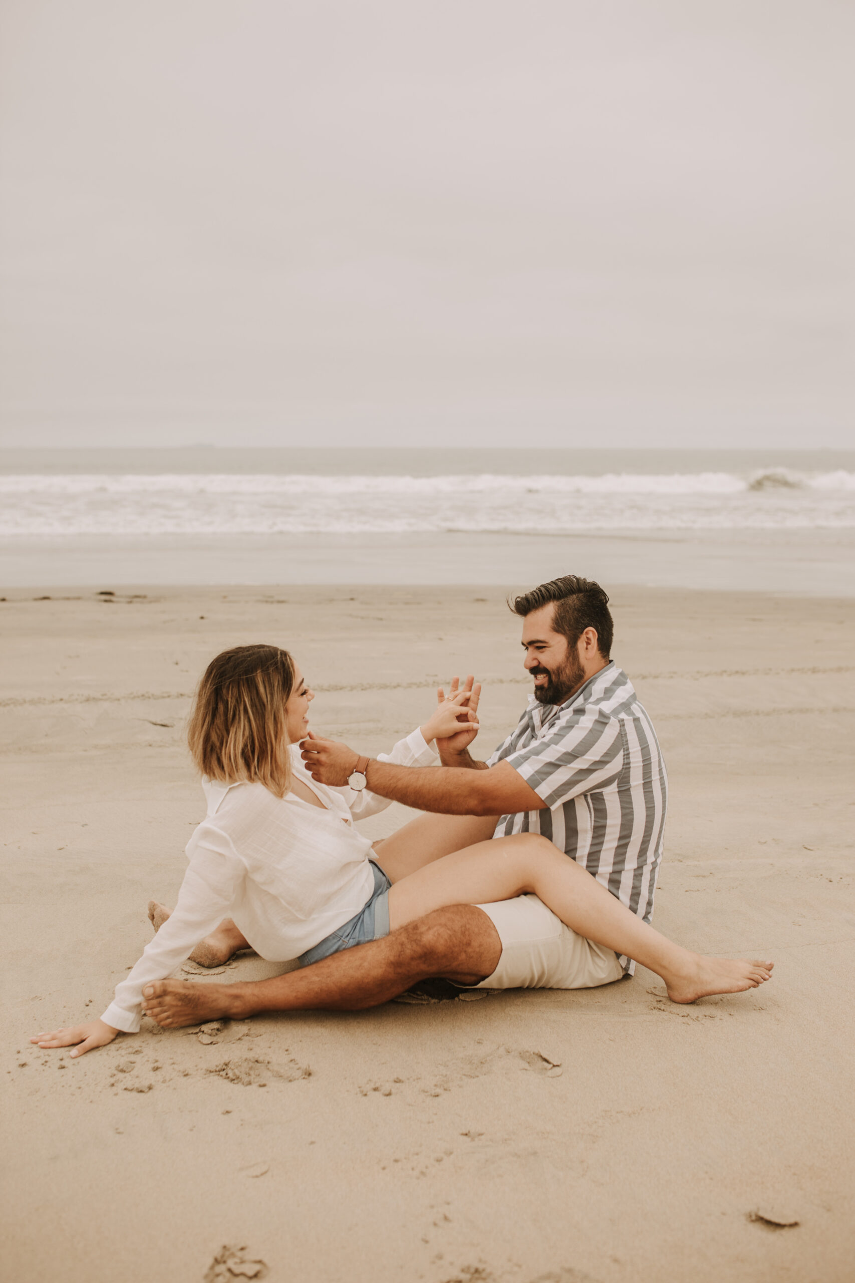 engagement photos San Diego couples photographer surprise proposal engagement couples beach photos romantic beach photos San Diego photographer Sabrina Kinsella