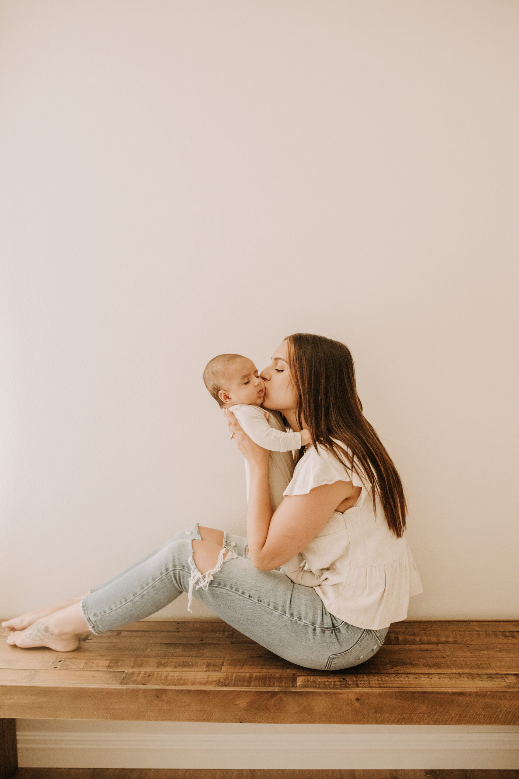 warm toned tan beige in home newborn baby photos family photos newborn baby new mom and dad San Diego family photographer Sabrina kinsella sabrinalynnphoto