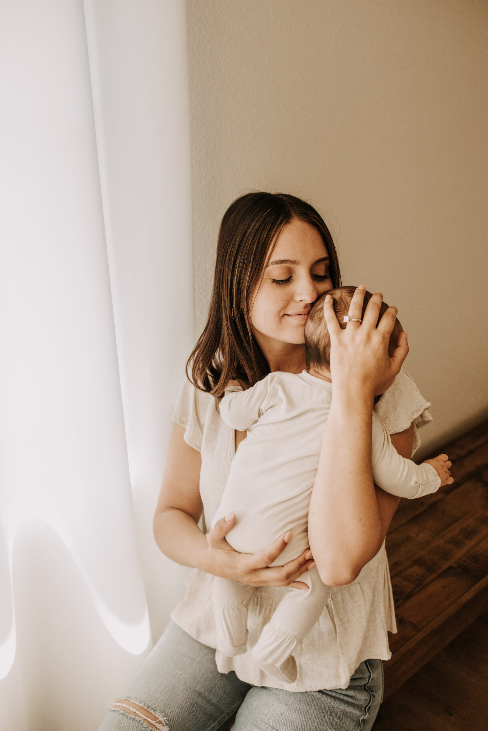 warm toned tan beige in home newborn baby photos family photos newborn baby new mom and dad San Diego family photographer Sabrina kinsella sabrinalynnphoto