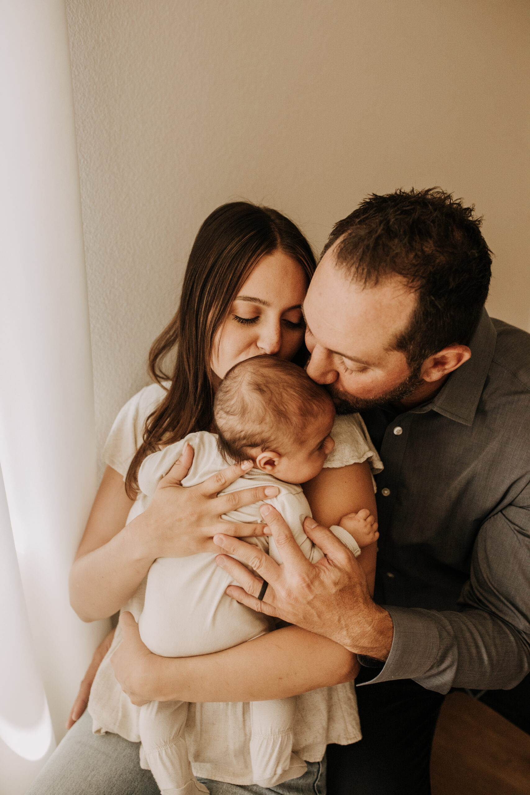 warm toned tan beige in home newborn baby photos family photos newborn baby new mom and dad San Diego family photographer Sabrina kinsella sabrinalynnphoto