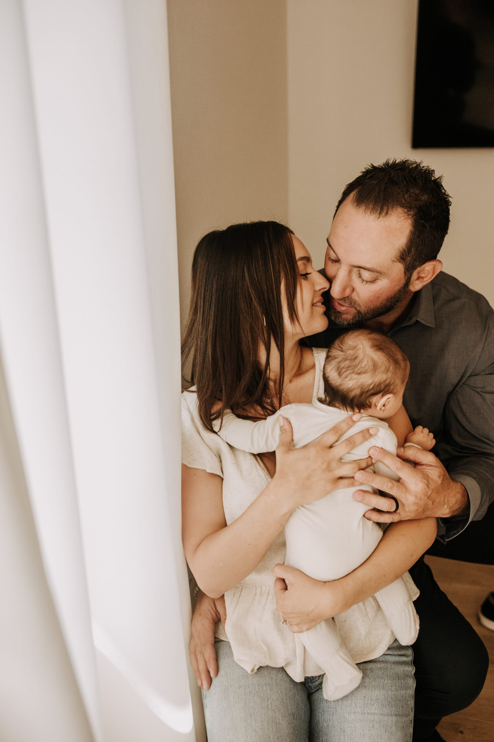 warm toned tan beige in home newborn baby photos family photos newborn baby new mom and dad San Diego family photographer Sabrina kinsella sabrinalynnphoto