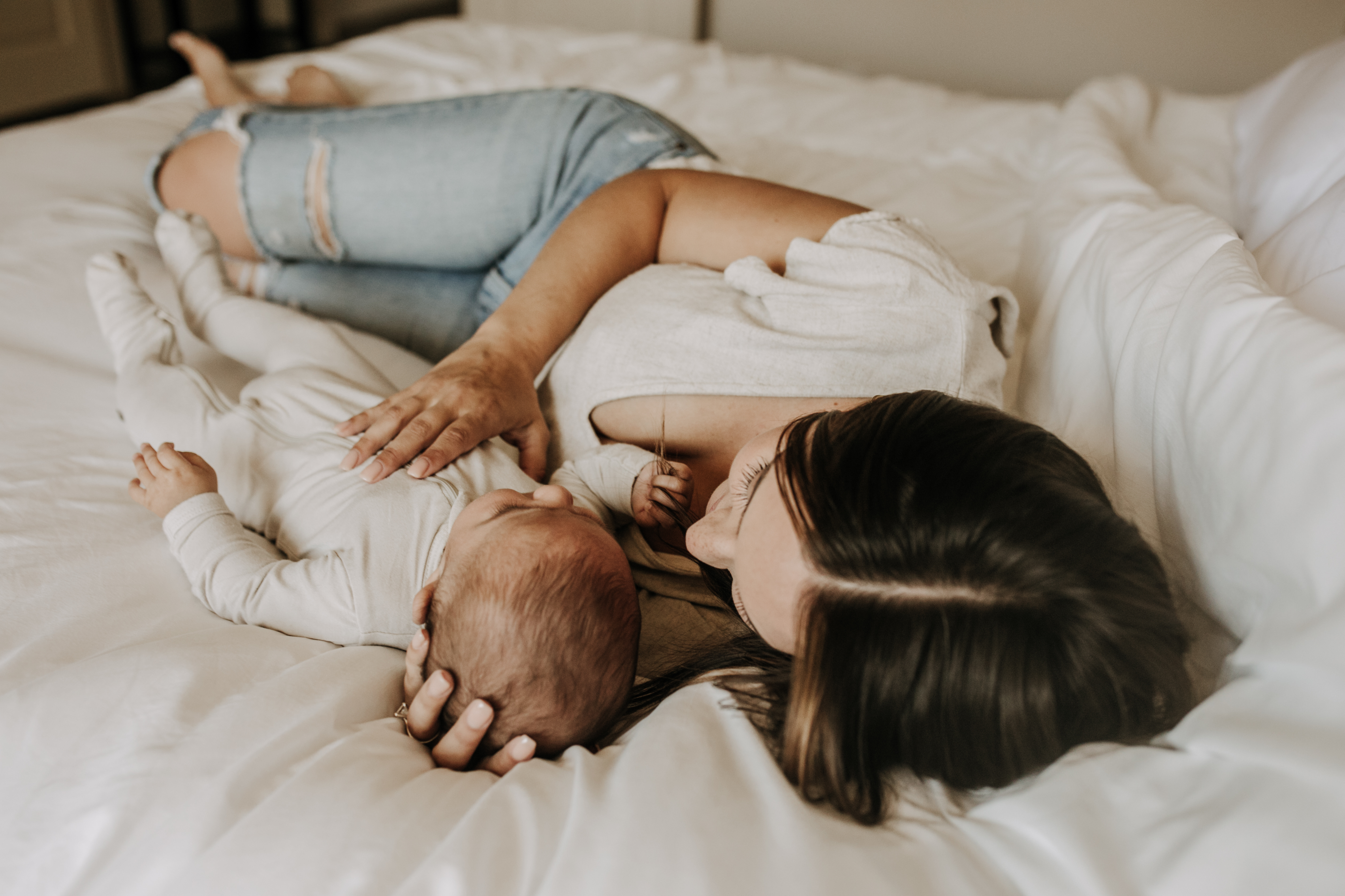 warm toned tan beige in home newborn baby photos family photos newborn baby new mom and dad San Diego family photographer Sabrina kinsella sabrinalynnphoto