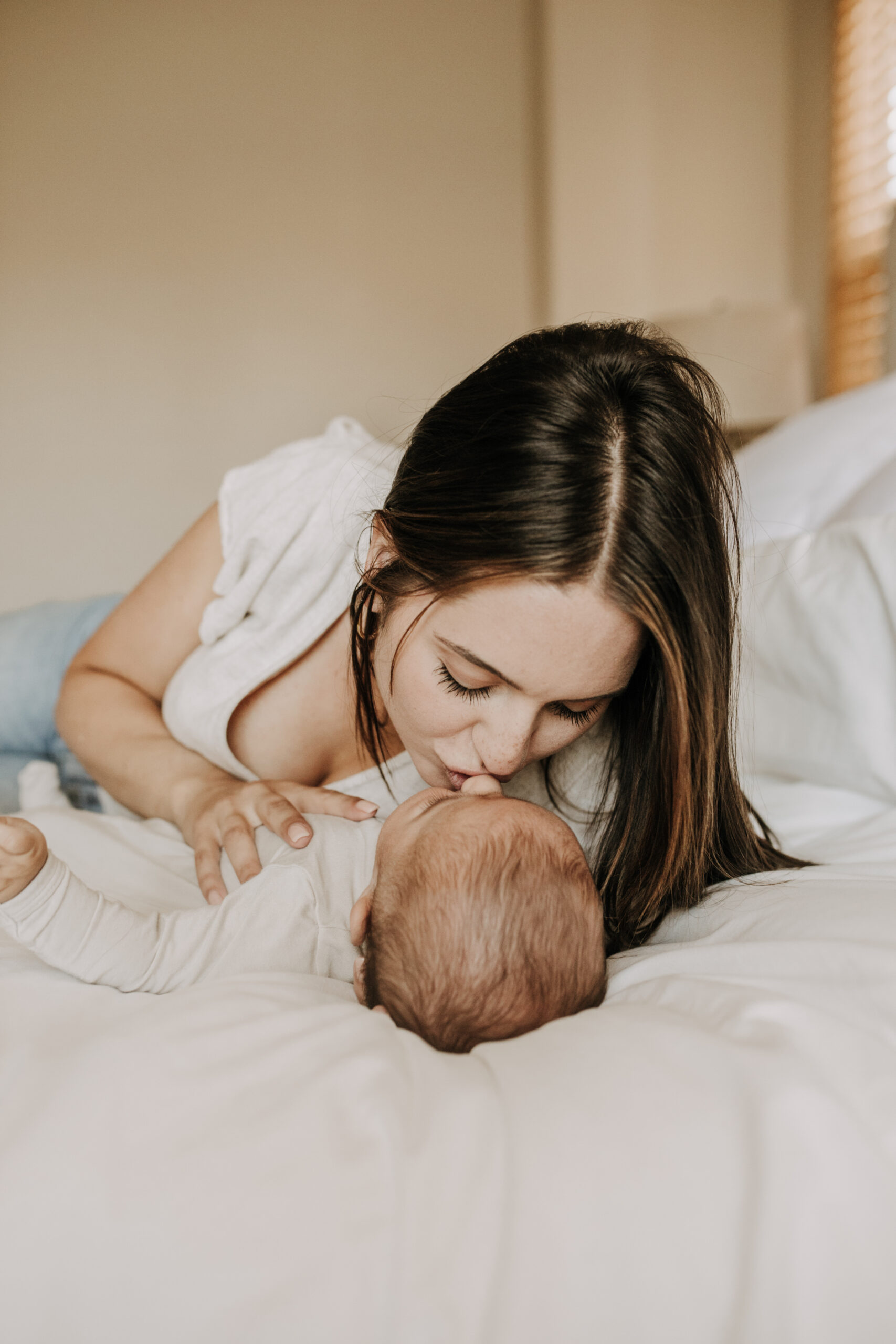 warm toned tan beige in home newborn baby photos family photos newborn baby new mom and dad San Diego family photographer Sabrina kinsella sabrinalynnphoto