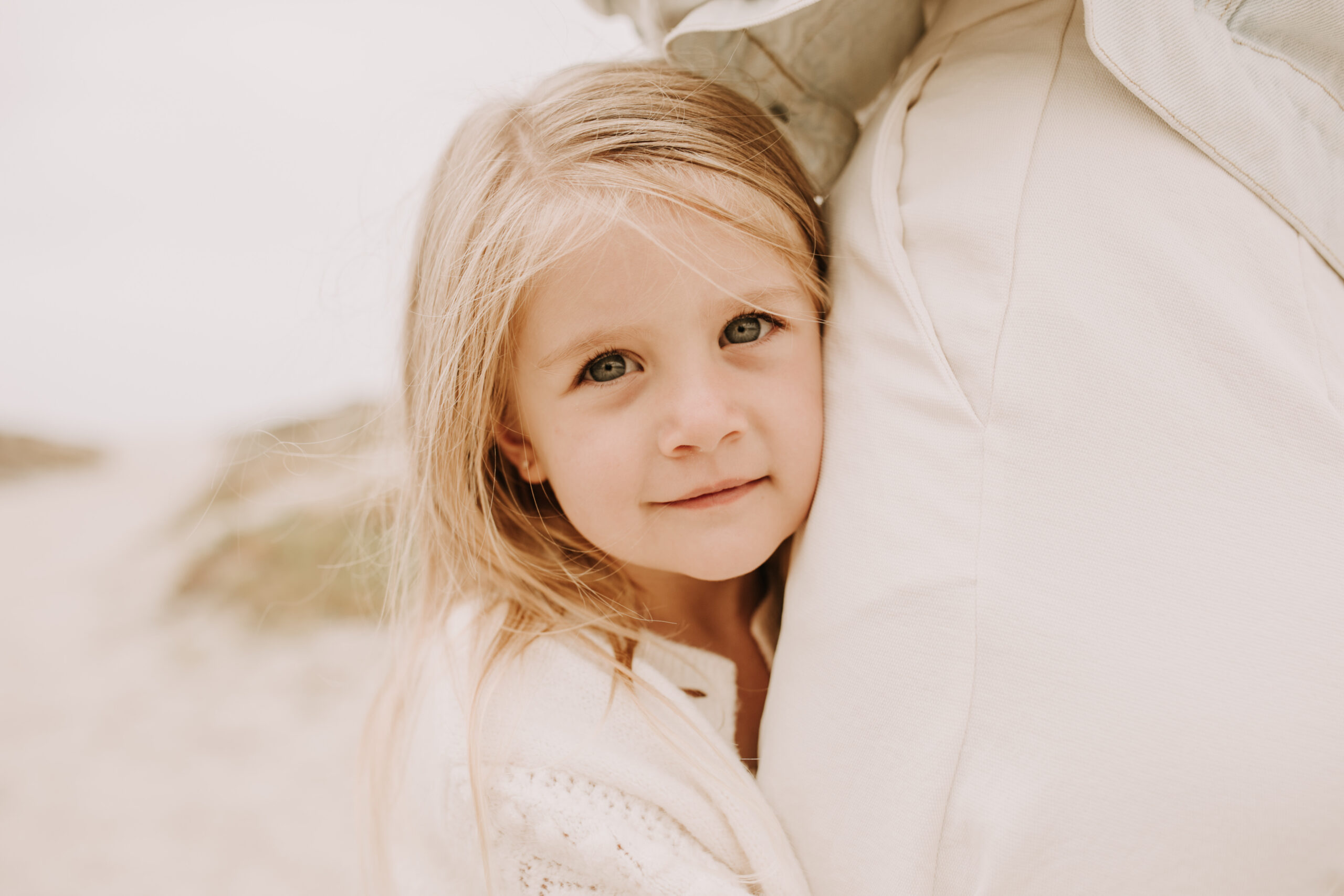 warm toned neutral color outdoor family photos beach day family photos newborn photos infant family cloudy day san digo family photographer Sabrina Kinsella