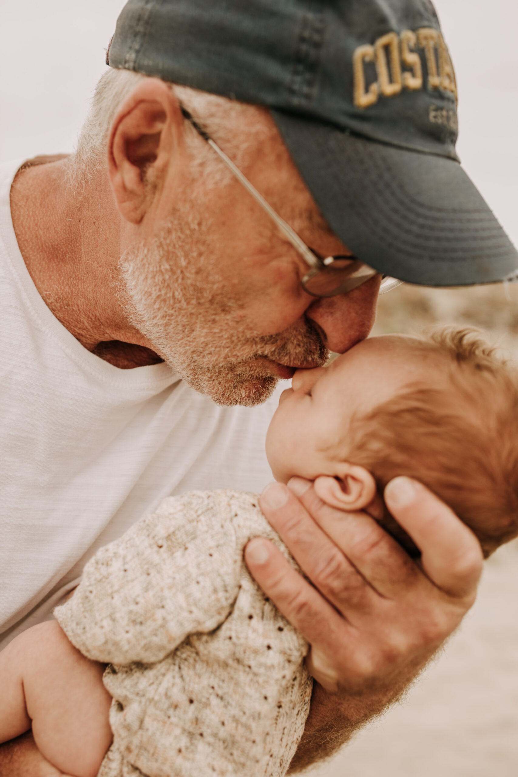 warm toned neutral color outdoor family photos beach day family photos newborn photos infant family cloudy day san digo family photographer Sabrina Kinsella