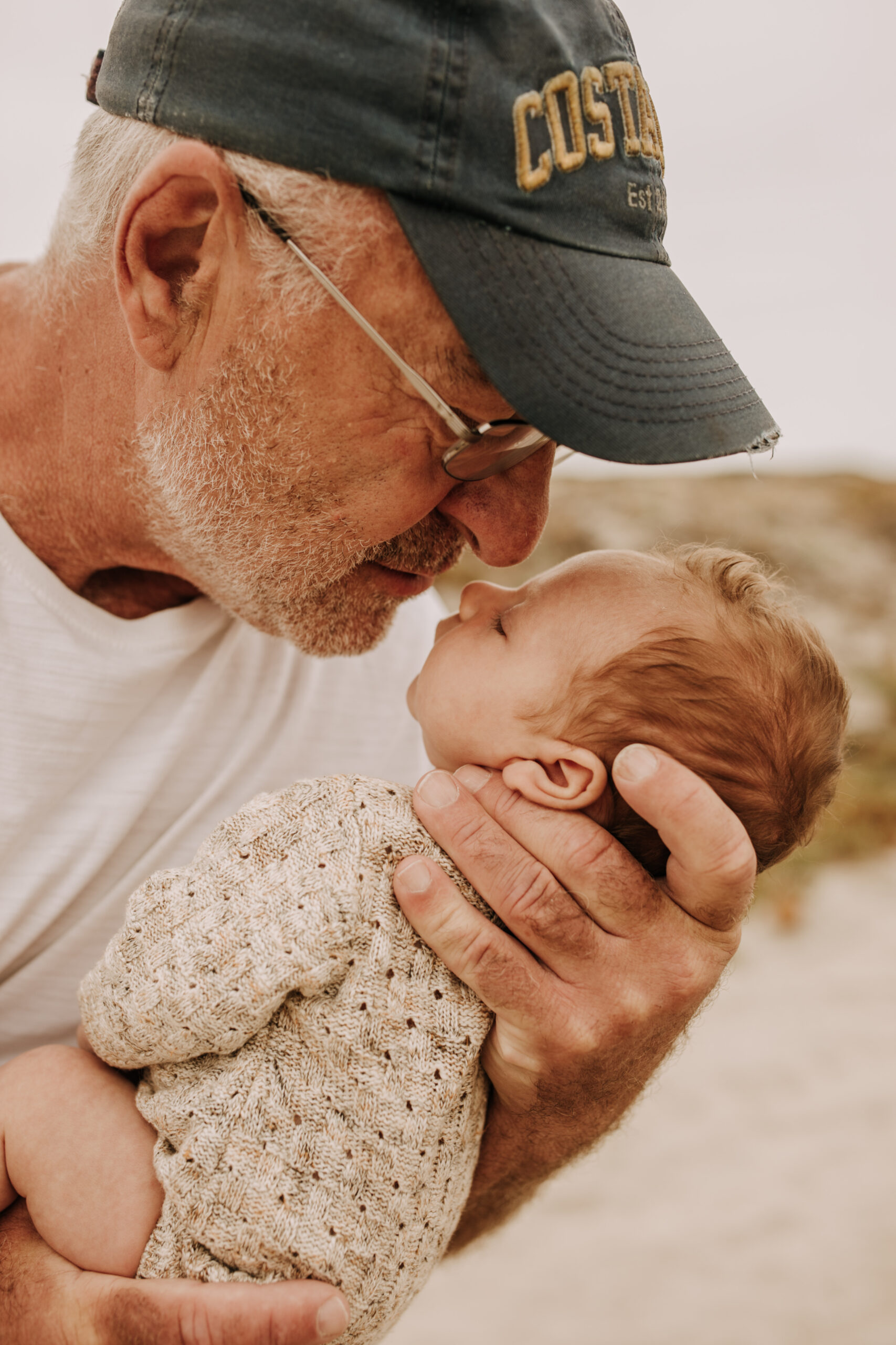 warm toned neutral color outdoor family photos beach day family photos newborn photos infant family cloudy day san digo family photographer Sabrina Kinsella