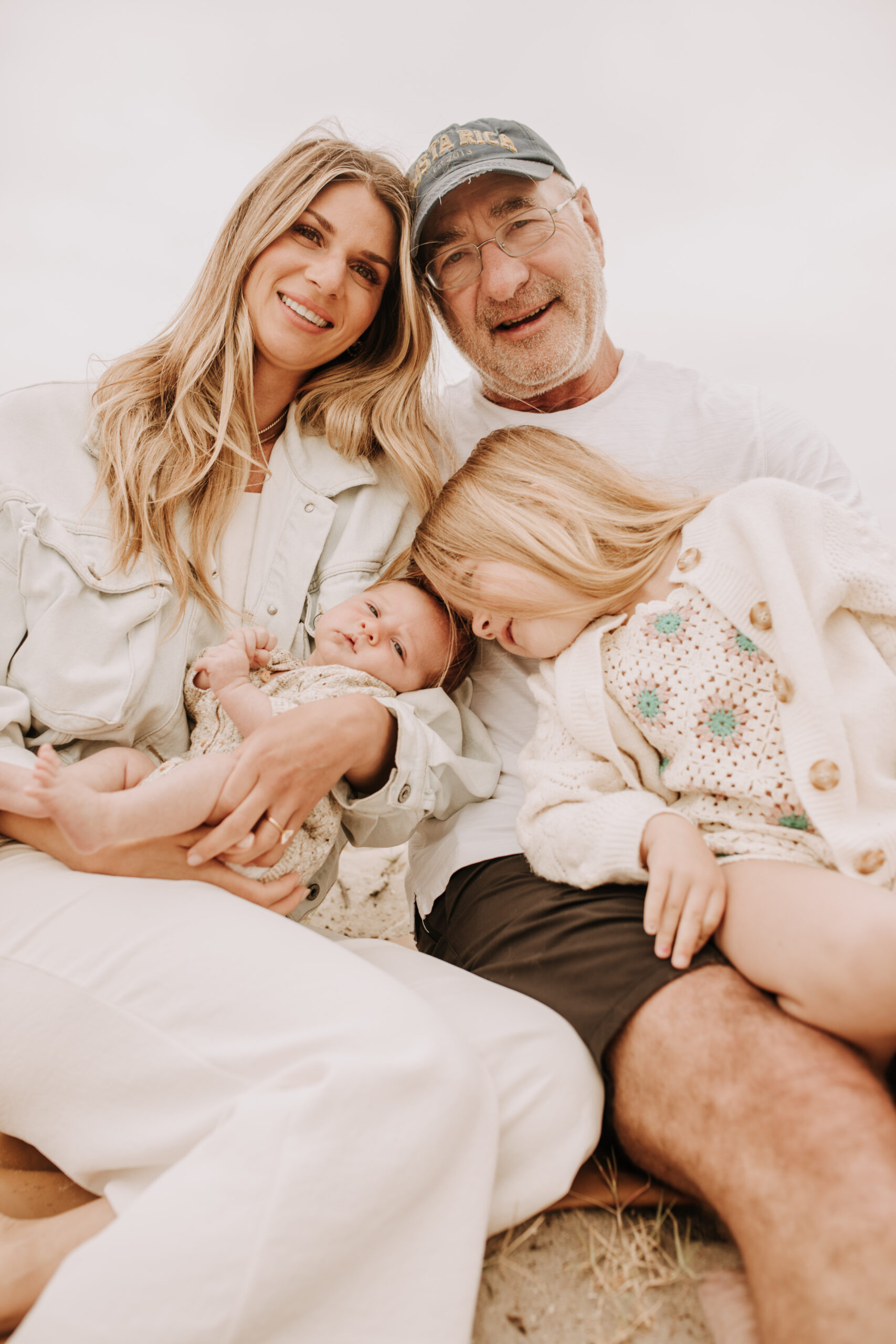 warm toned neutral color outdoor family photos beach day family photos newborn photos infant family cloudy day san digo family photographer Sabrina Kinsella