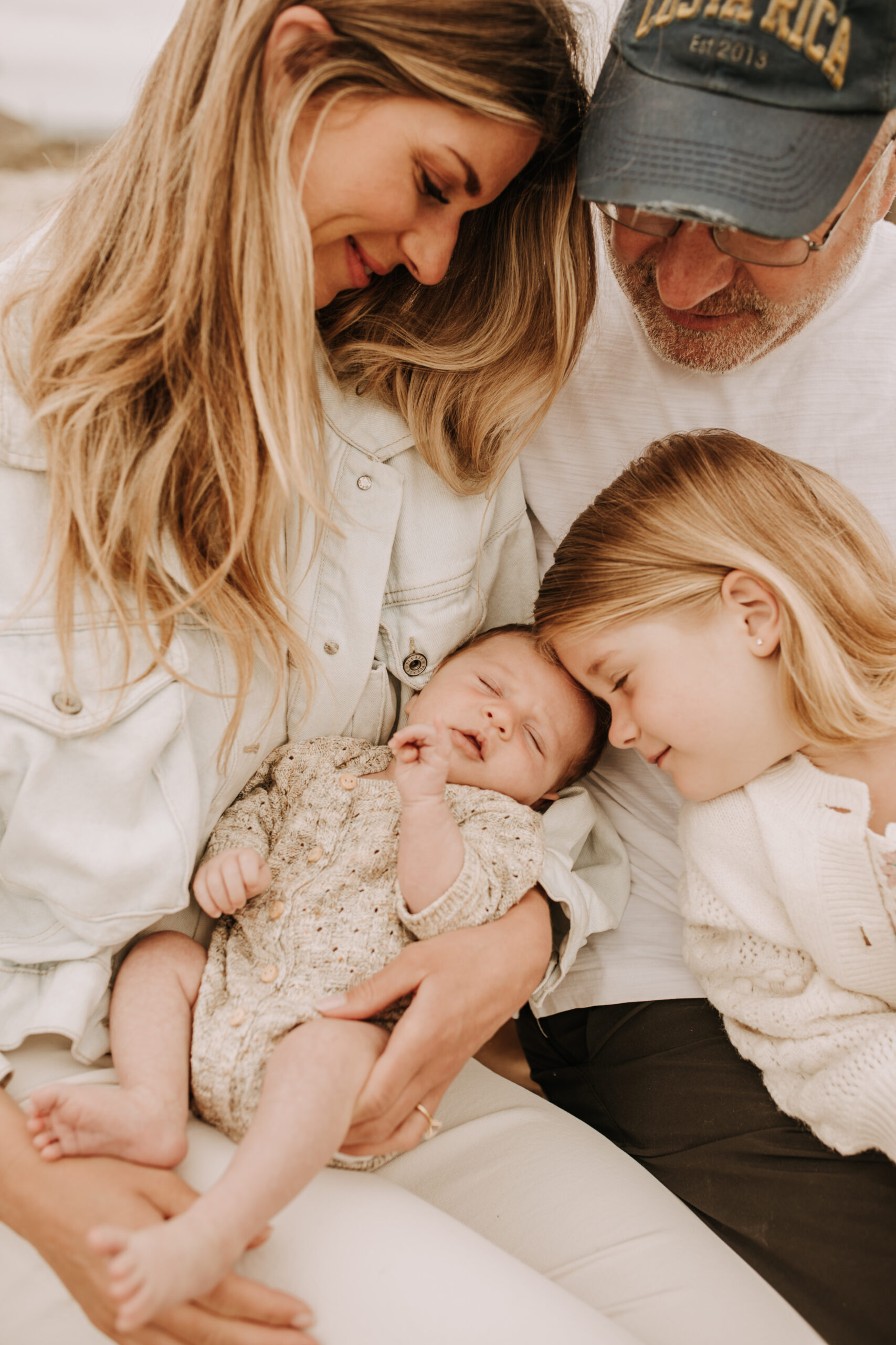 warm toned neutral color outdoor family photos beach day family photos newborn photos infant family cloudy day san digo family photographer Sabrina Kinsella