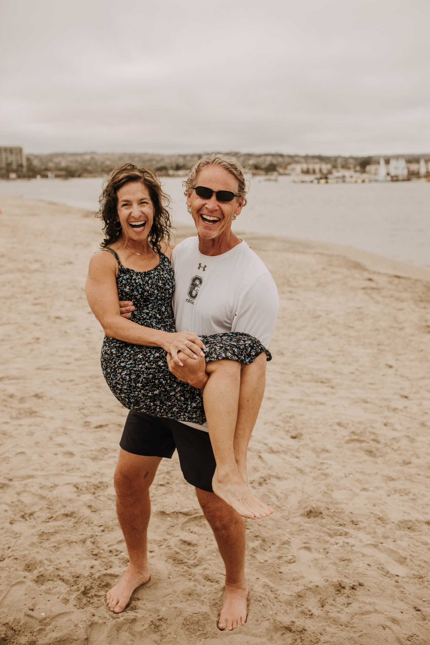 large family beach session family photos on the beach cloudy day big family great grand children San Diego family photographer