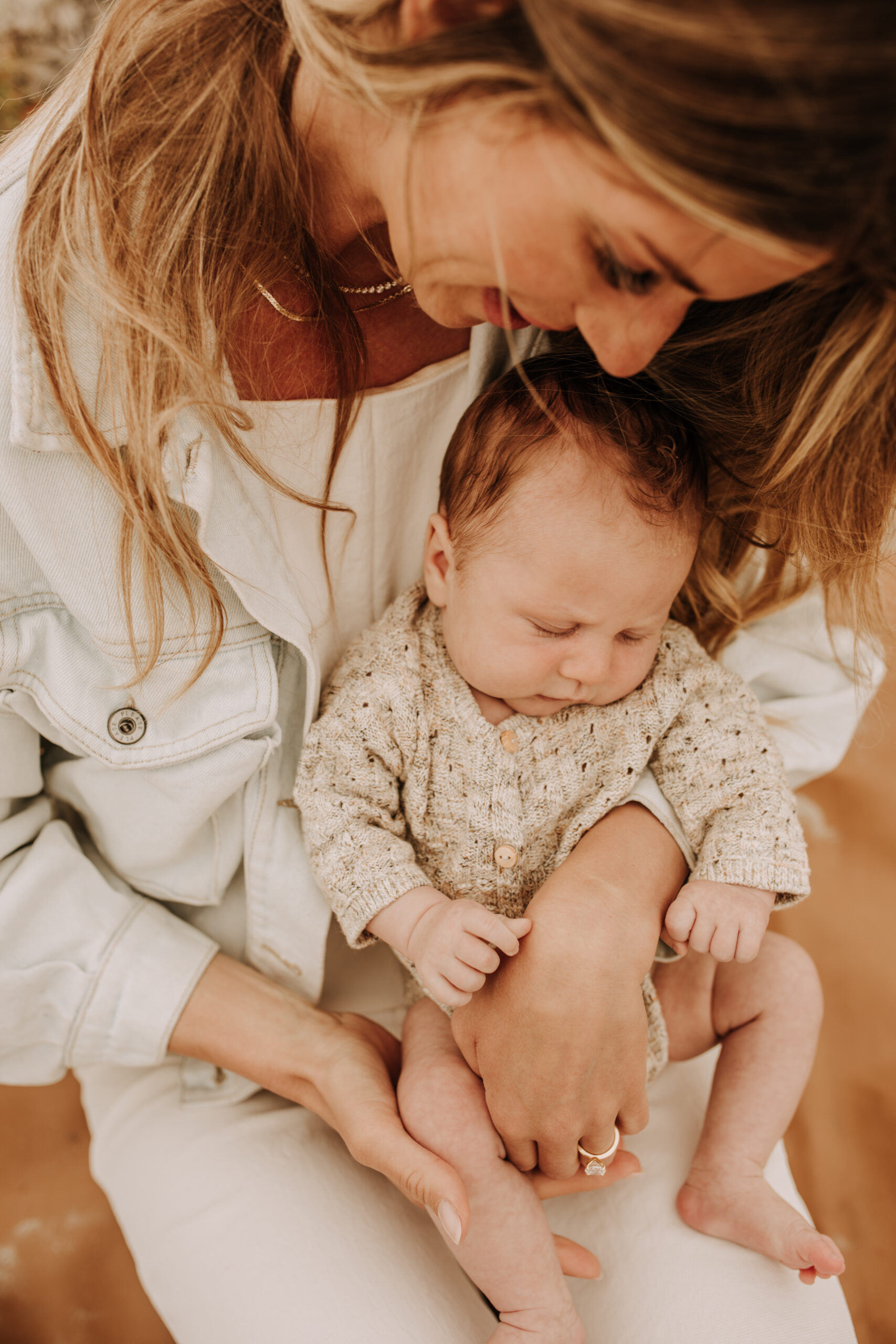 warm toned neutral color outdoor family photos beach day family photos newborn photos infant family cloudy day san digo family photographer Sabrina Kinsella