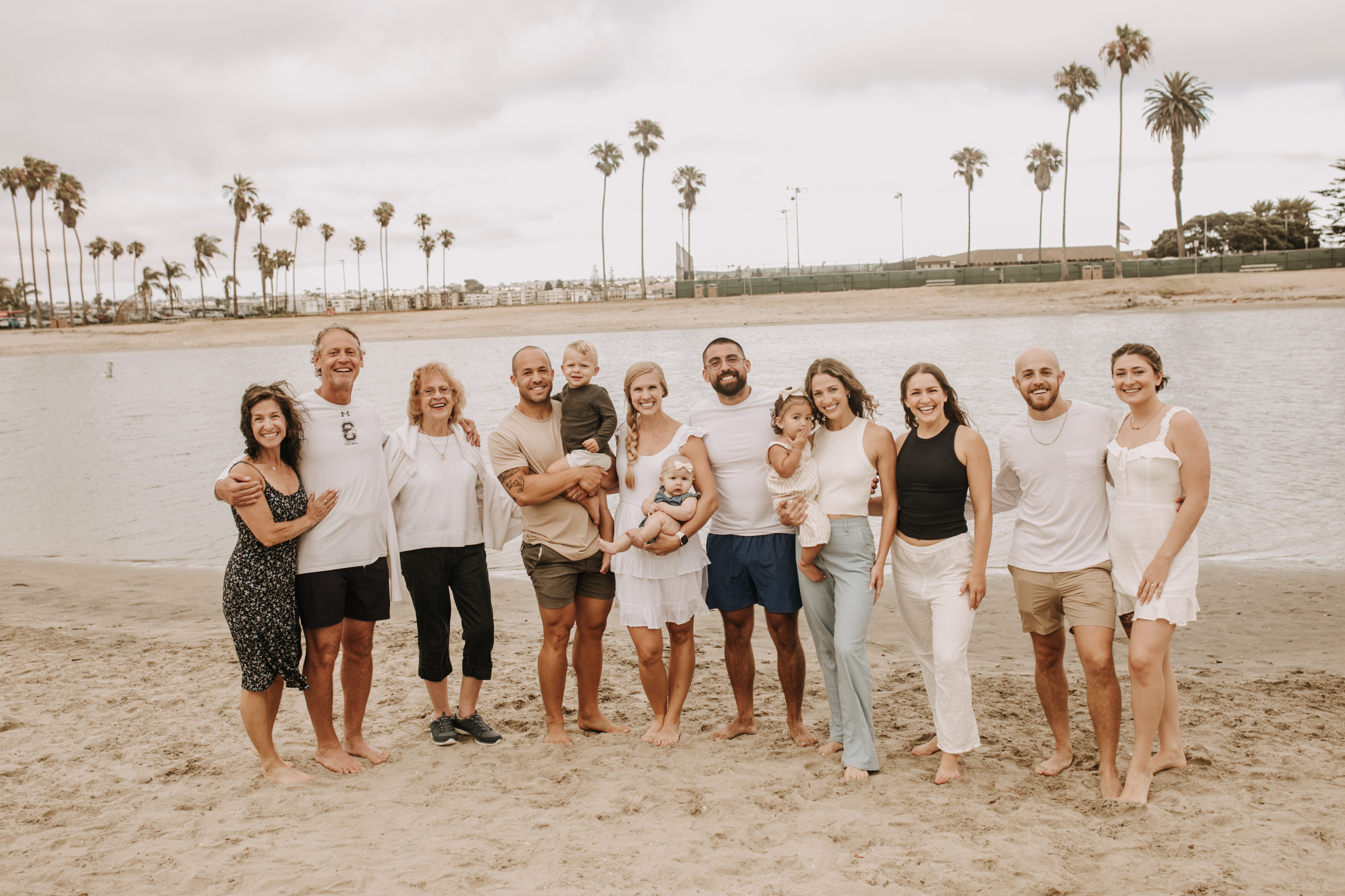 large family beach session family photos on the beach cloudy day big family great grand children San Diego family photographer