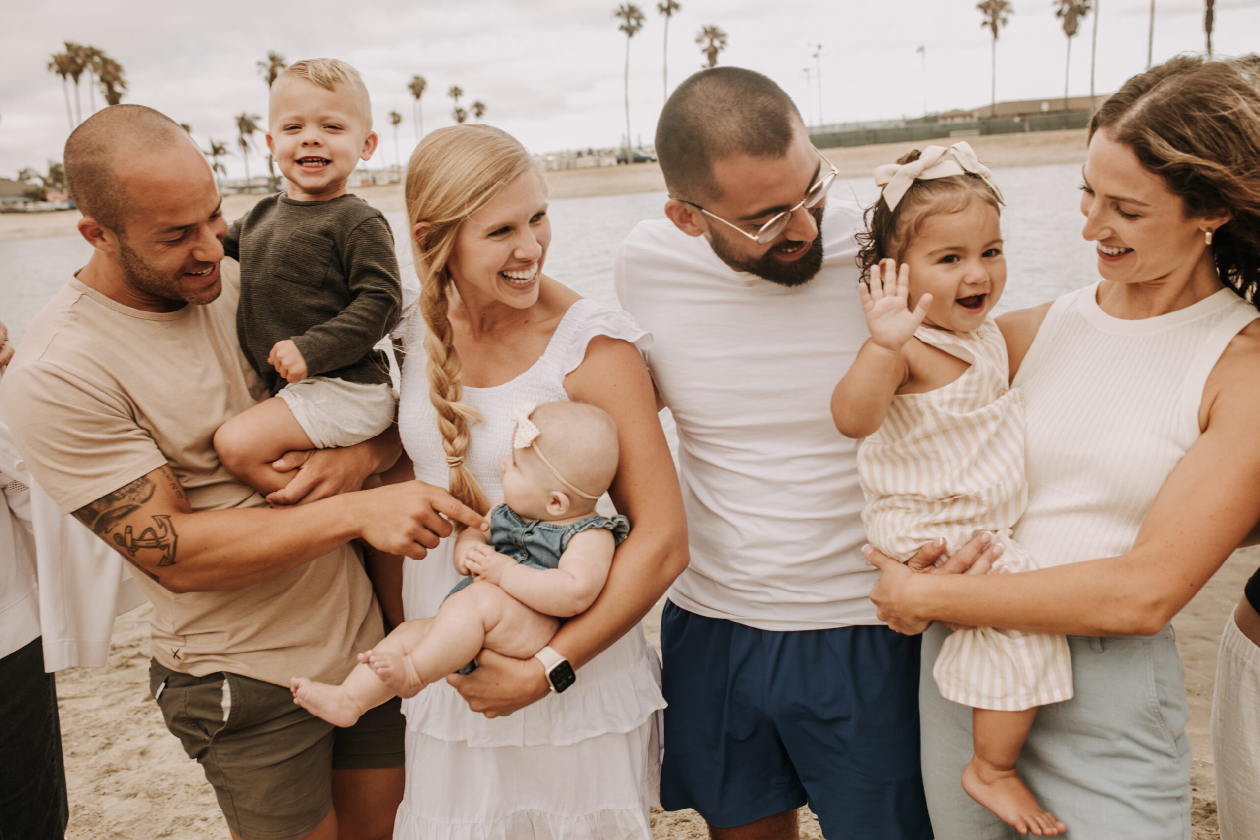 large family beach session family photos on the beach cloudy day big family great grand children San Diego family photographer