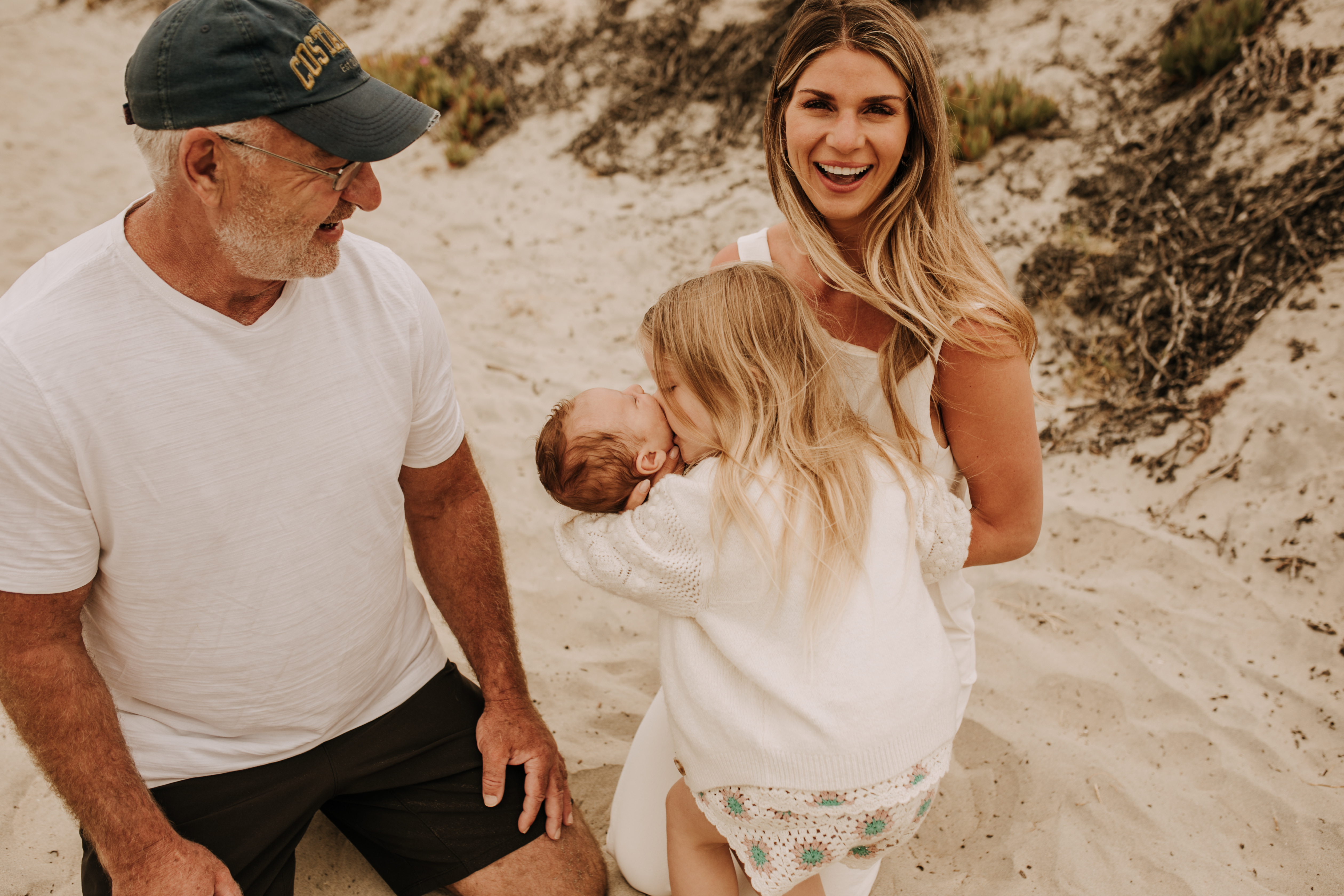 warm toned neutral color outdoor family photos beach day family photos newborn photos infant family cloudy day san digo family photographer Sabrina Kinsella 