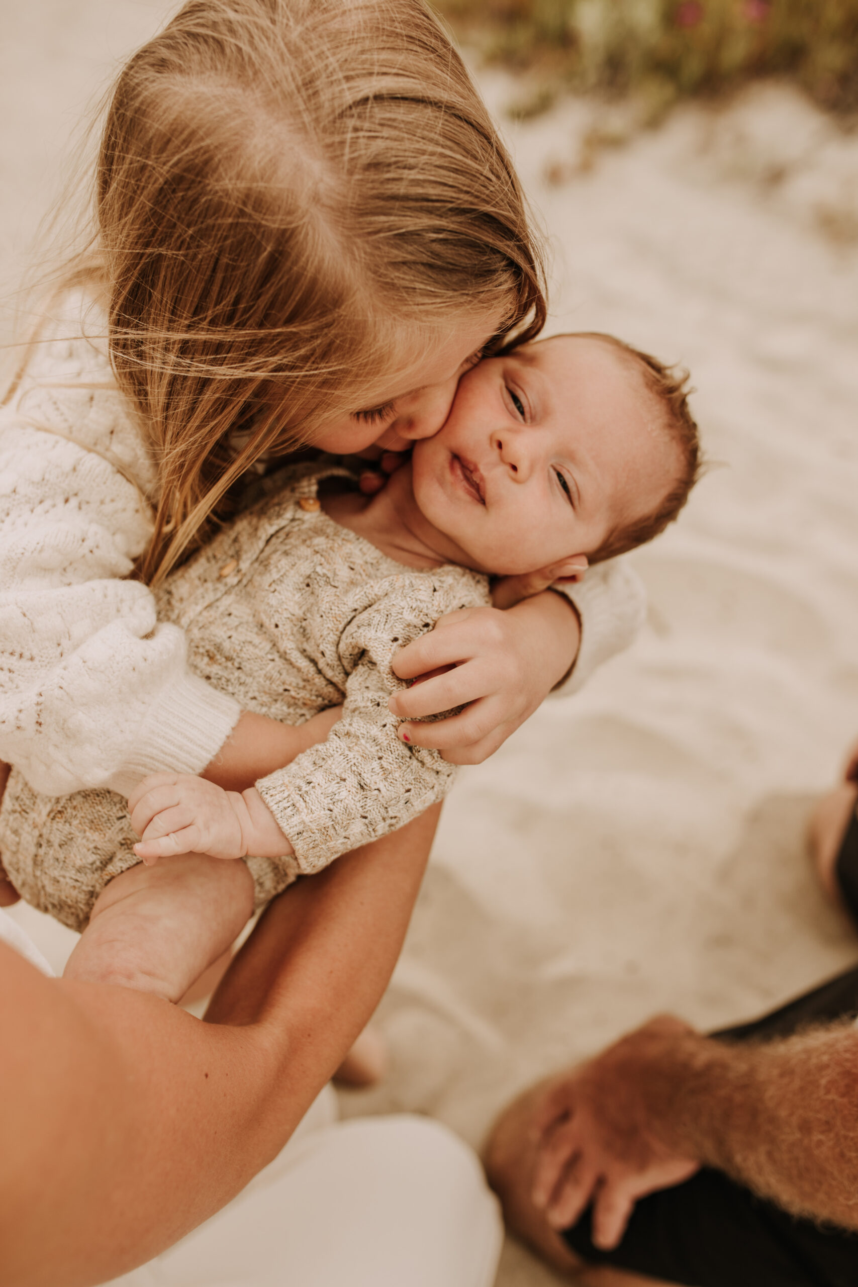 warm toned neutral color outdoor family photos beach day family photos newborn photos infant family cloudy day san digo family photographer Sabrina Kinsella