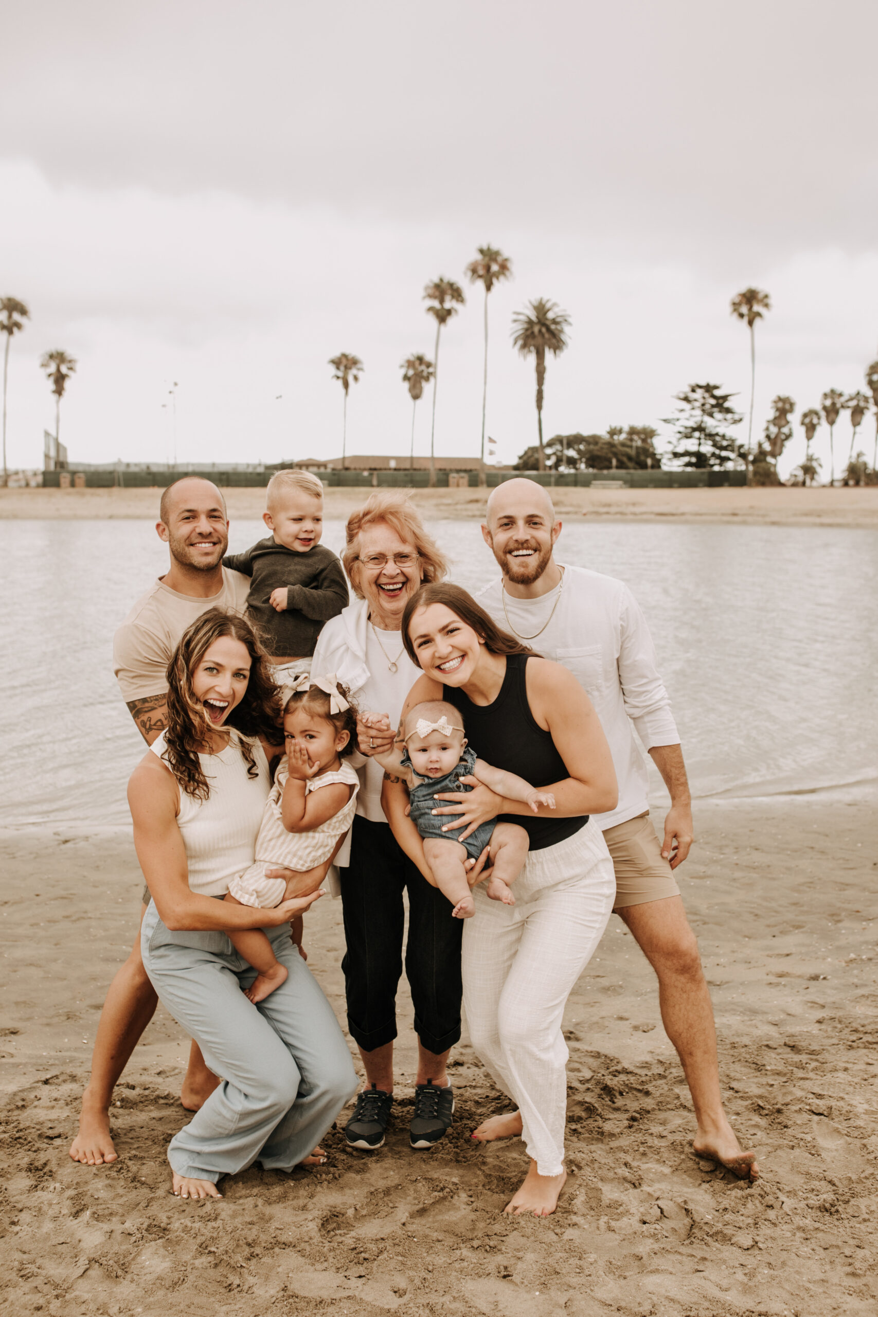 large family beach session family photos on the beach cloudy day big family great grand children San Diego family photographer