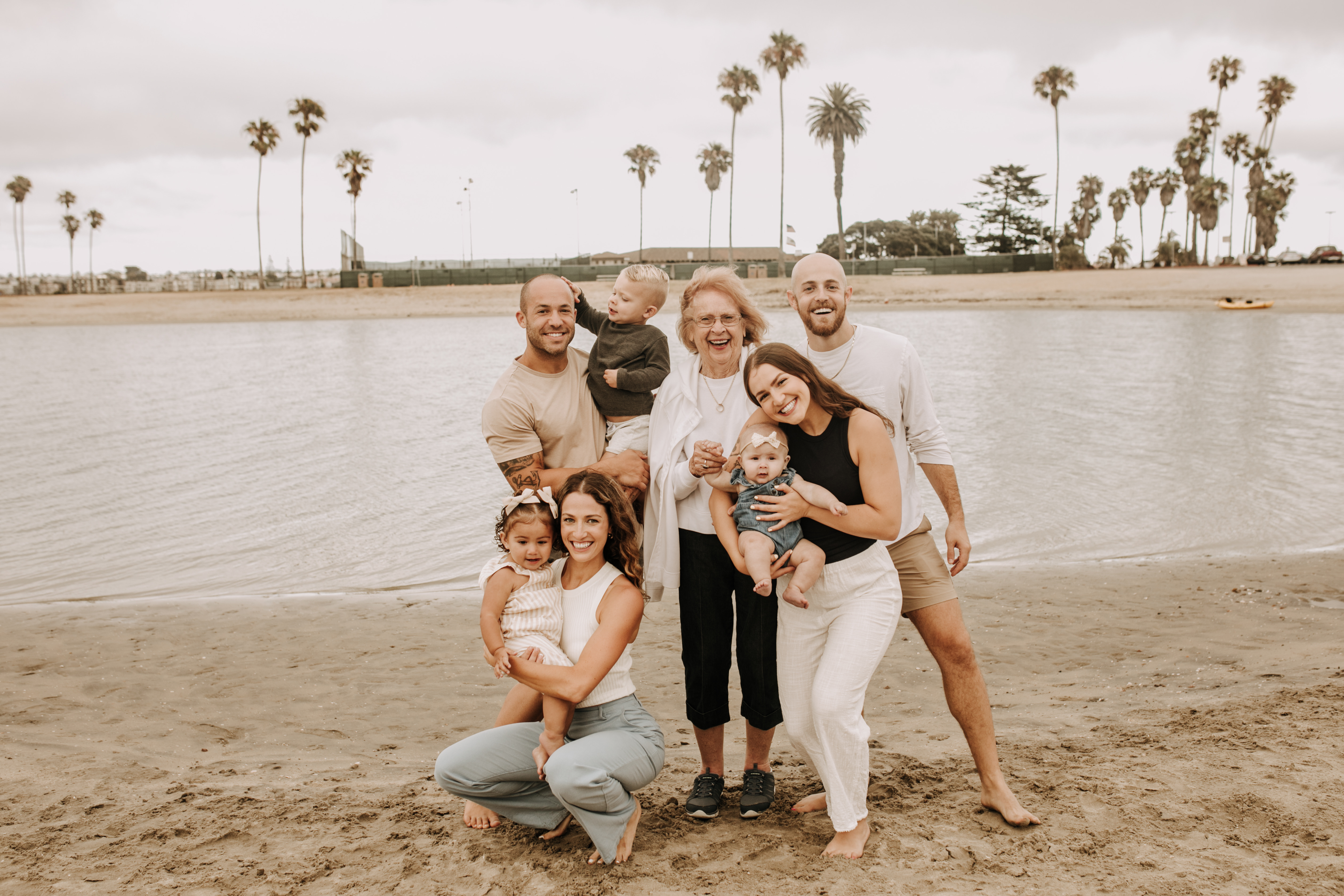 large family beach session family photos on the beach cloudy day big family great grand children San Diego family photographer