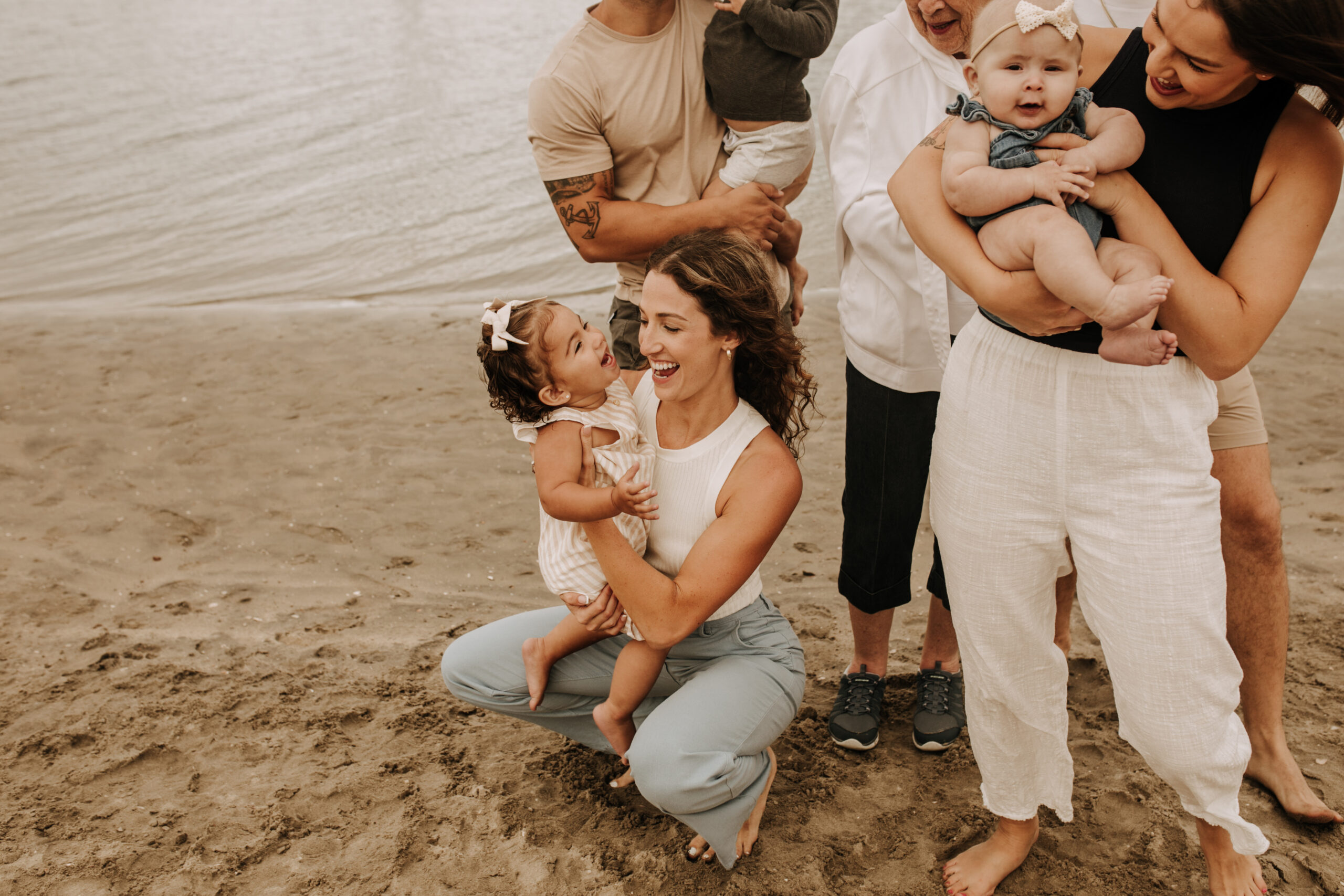 large family beach session family photos on the beach cloudy day big family great grand children San Diego family photographer