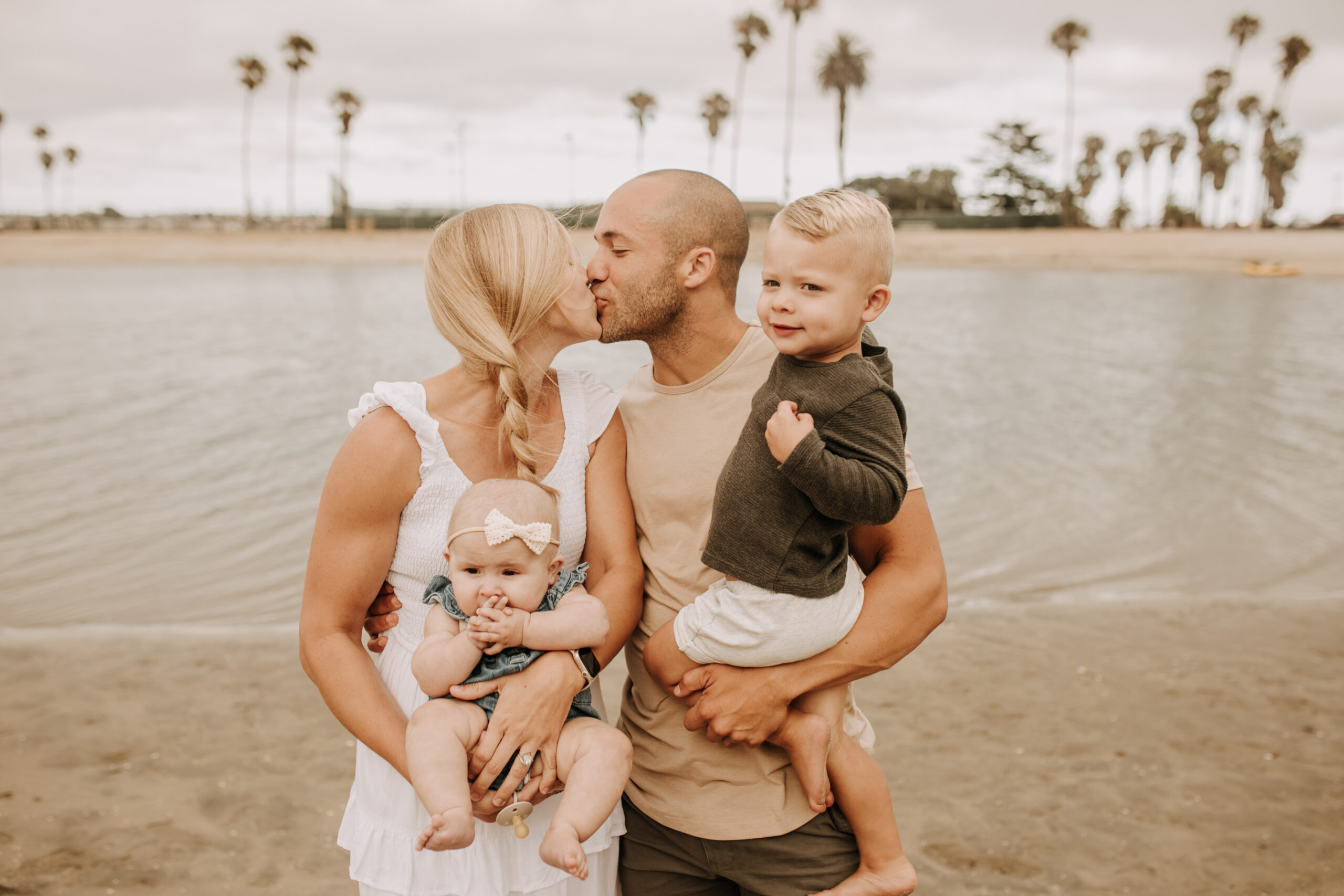 large family beach session family photos on the beach cloudy day big family great grand children San Diego family photographer