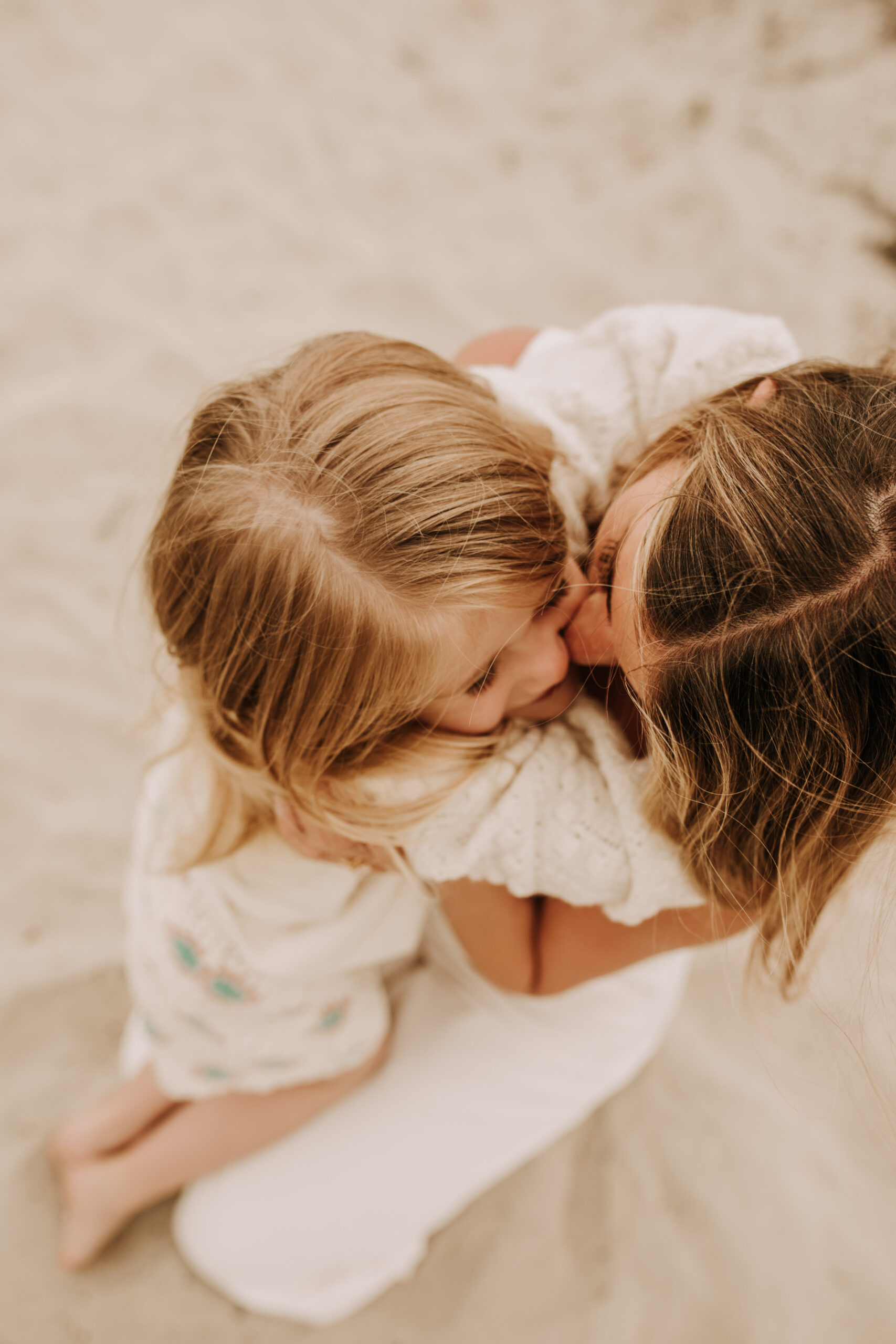 warm toned neutral color outdoor family photos beach day family photos newborn photos infant family cloudy day san digo family photographer Sabrina Kinsella