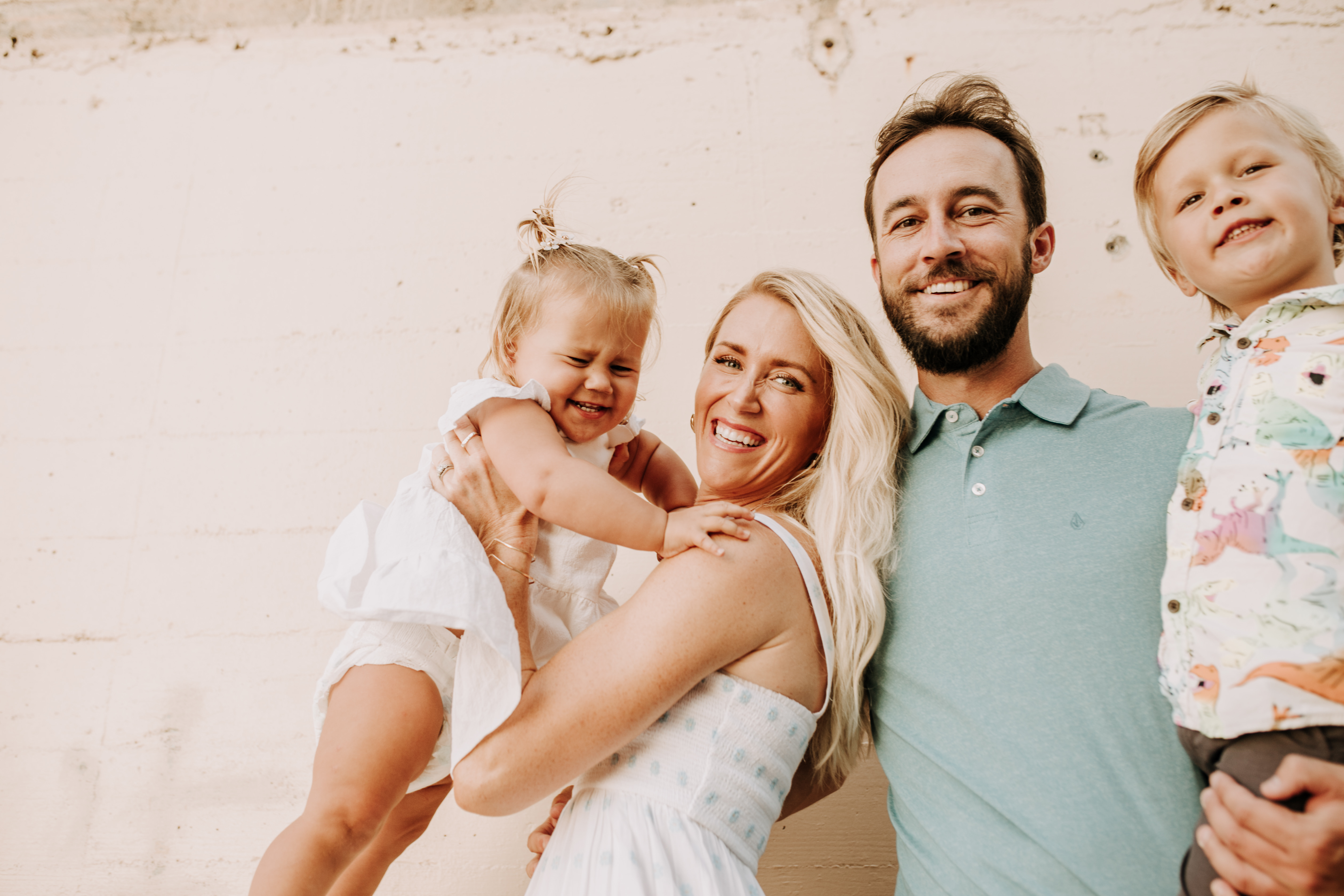 Family photos on the beach cool blue toned family photos San Diego photography family of four candid family moments family love beach family photos San Diego family photographer Sabrinalynnphoto