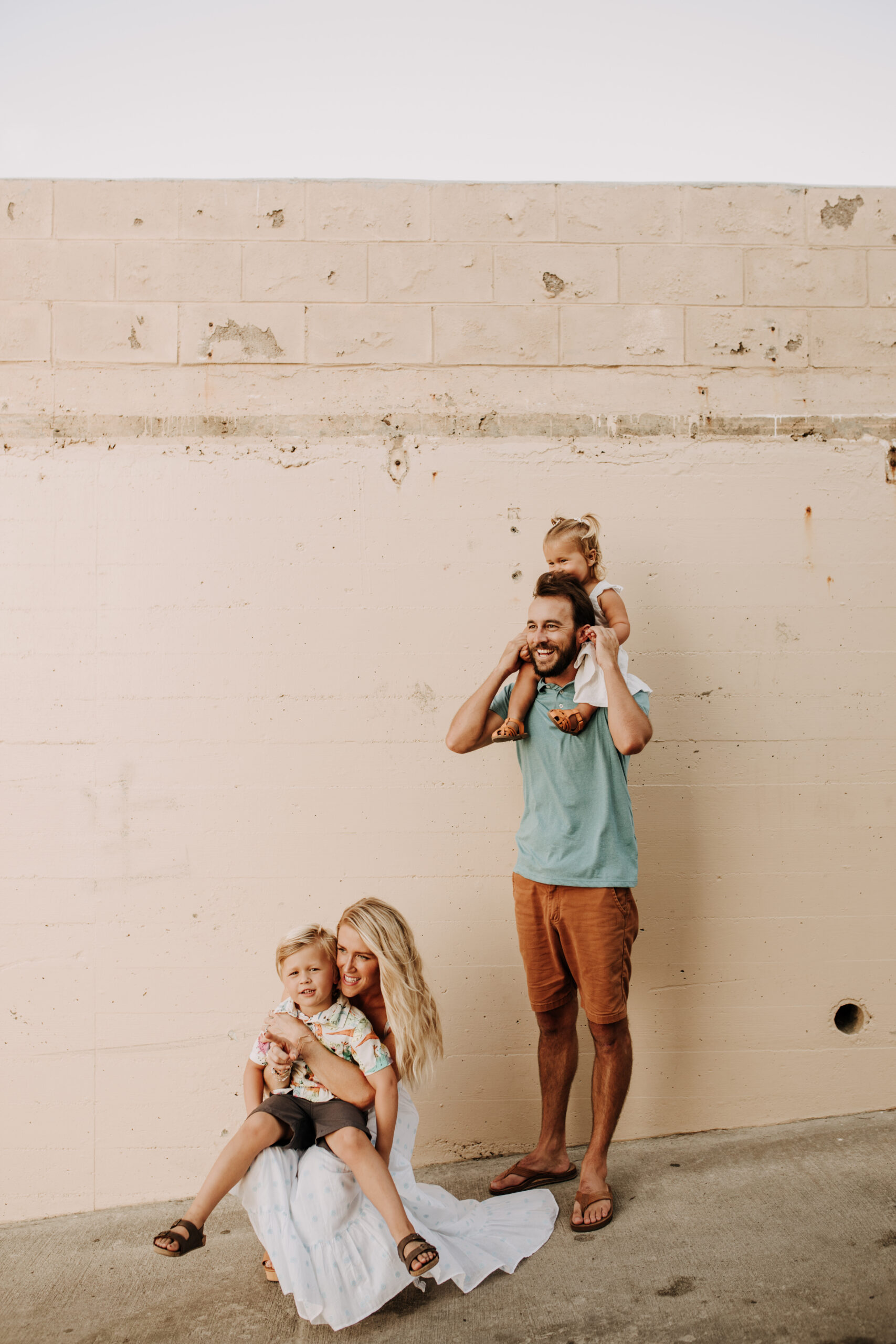 Family photos on the beach cool blue toned family photos San Diego photography family of four candid family moments family love beach family photos San Diego family photographer Sabrinalynnphoto