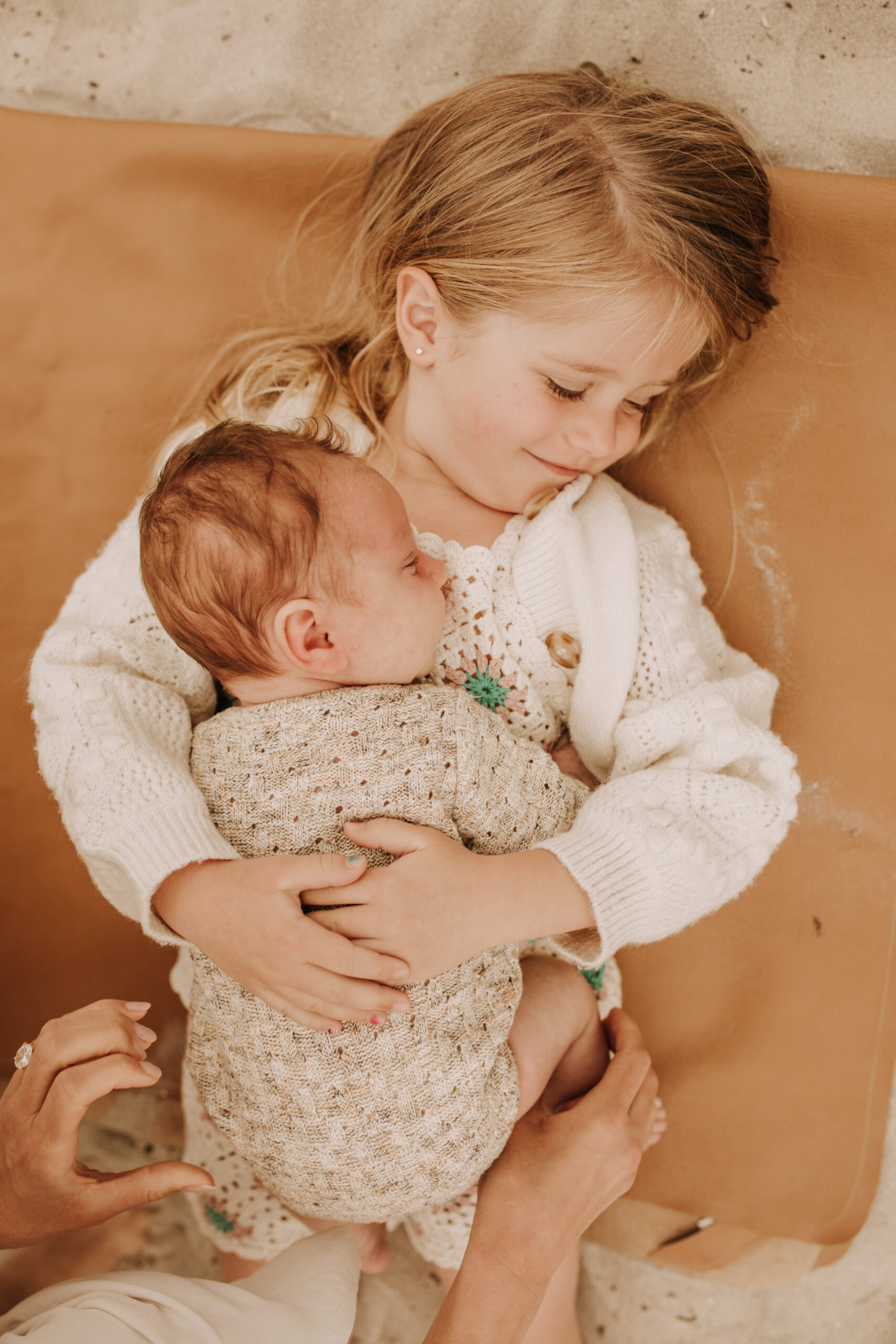 warm toned neutral color outdoor family photos beach day family photos newborn photos infant family cloudy day san digo family photographer Sabrina Kinsella