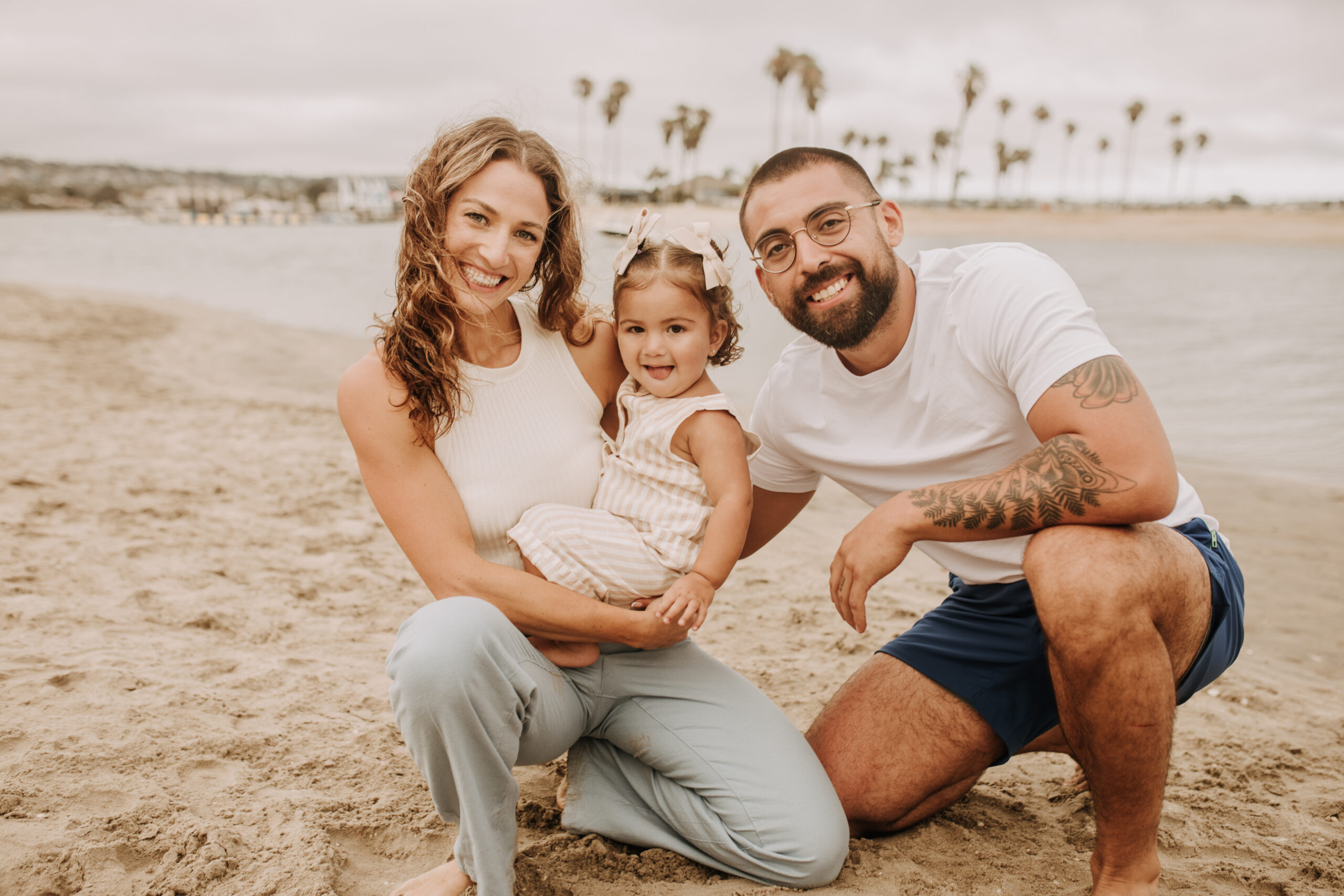 large family beach session family photos on the beach cloudy day big family great grand children San Diego family photographer