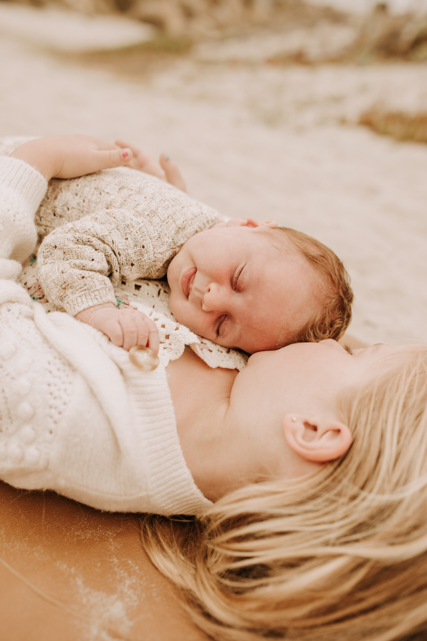 warm toned neutral color outdoor family photos beach day family photos newborn photos infant family cloudy day san digo family photographer Sabrina Kinsella