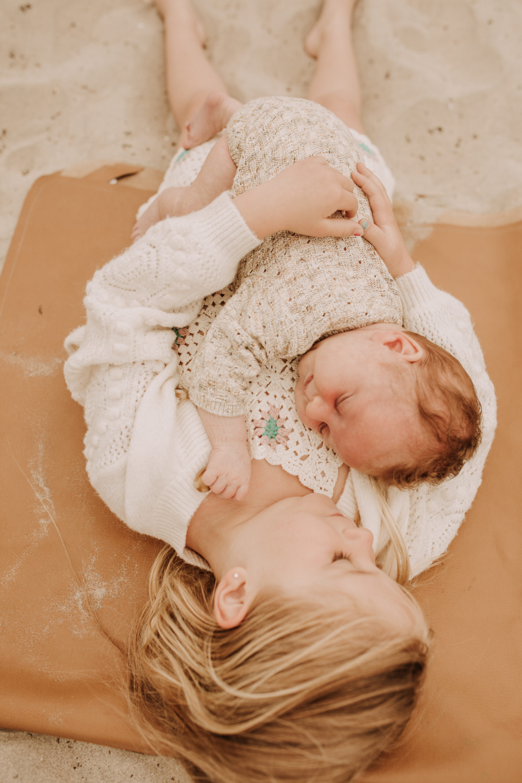 warm toned neutral color outdoor family photos beach day family photos newborn photos infant family cloudy day san digo family photographer Sabrina Kinsella