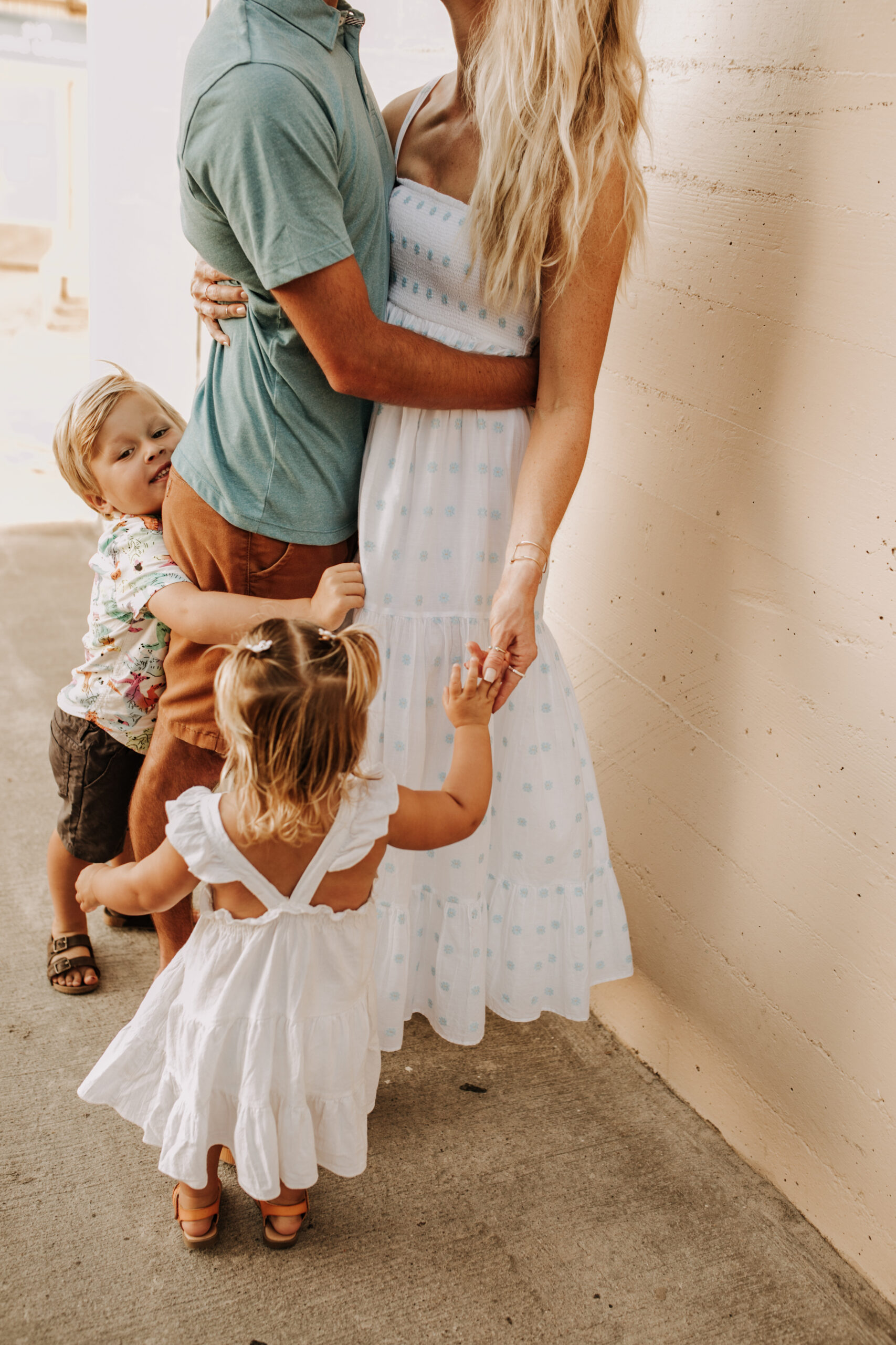 Family photos on the beach cool blue toned family photos San Diego photography family of four candid family moments family love beach family photos San Diego family photographer Sabrinalynnphoto