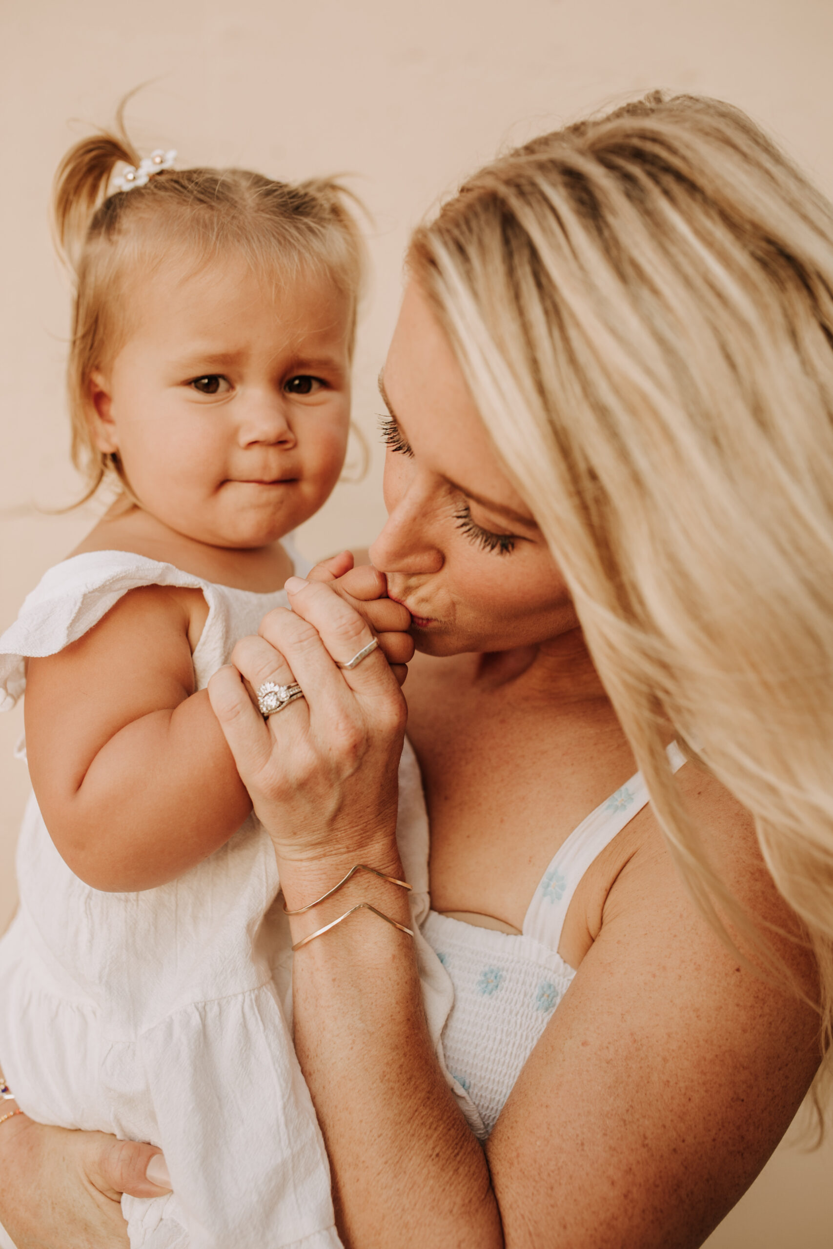 Family photos on the beach cool blue toned family photos San Diego photography family of four candid family moments family love beach family photos San Diego family photographer Sabrinalynnphoto