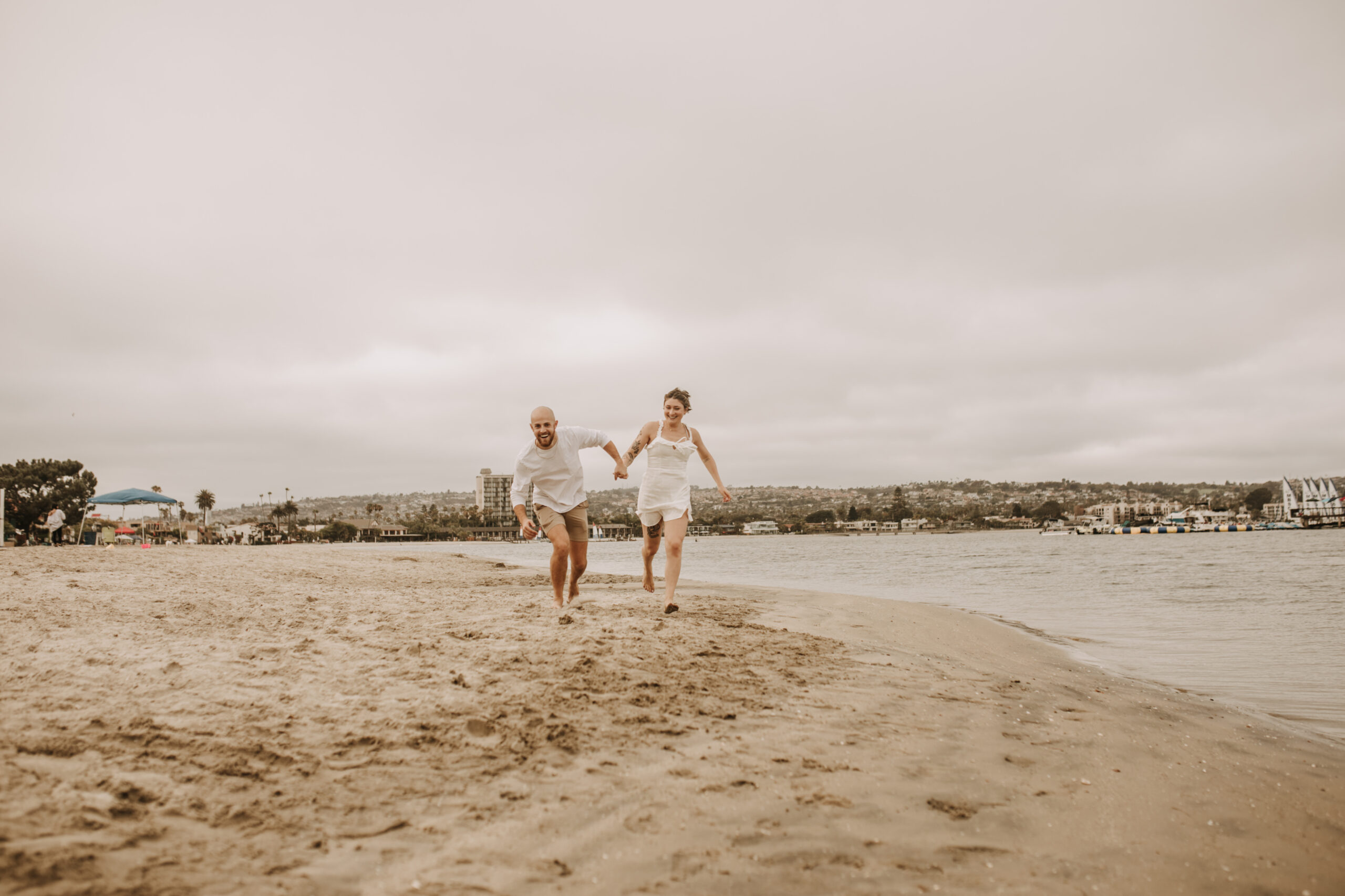 large family beach session family photos on the beach cloudy day big family great grand children San Diego family photographer