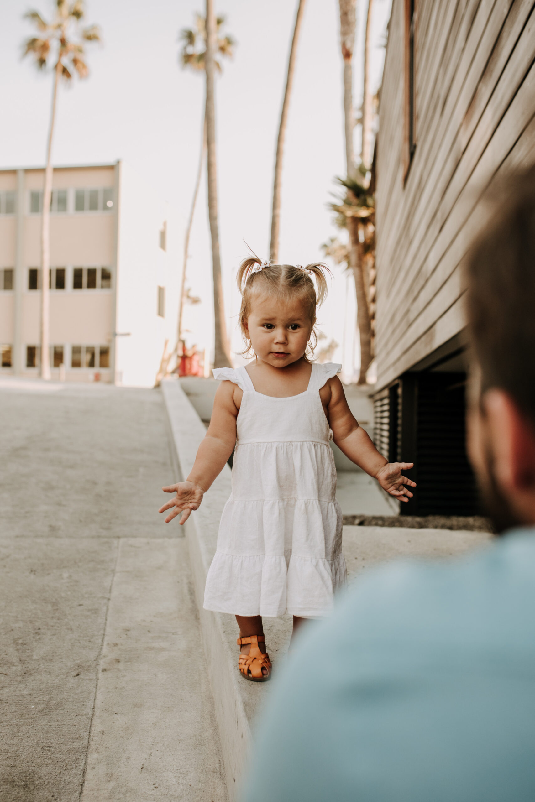 Family photos on the beach cool blue toned family photos San Diego photography family of four candid family moments family love beach family photos San Diego family photographer Sabrinalynnphoto