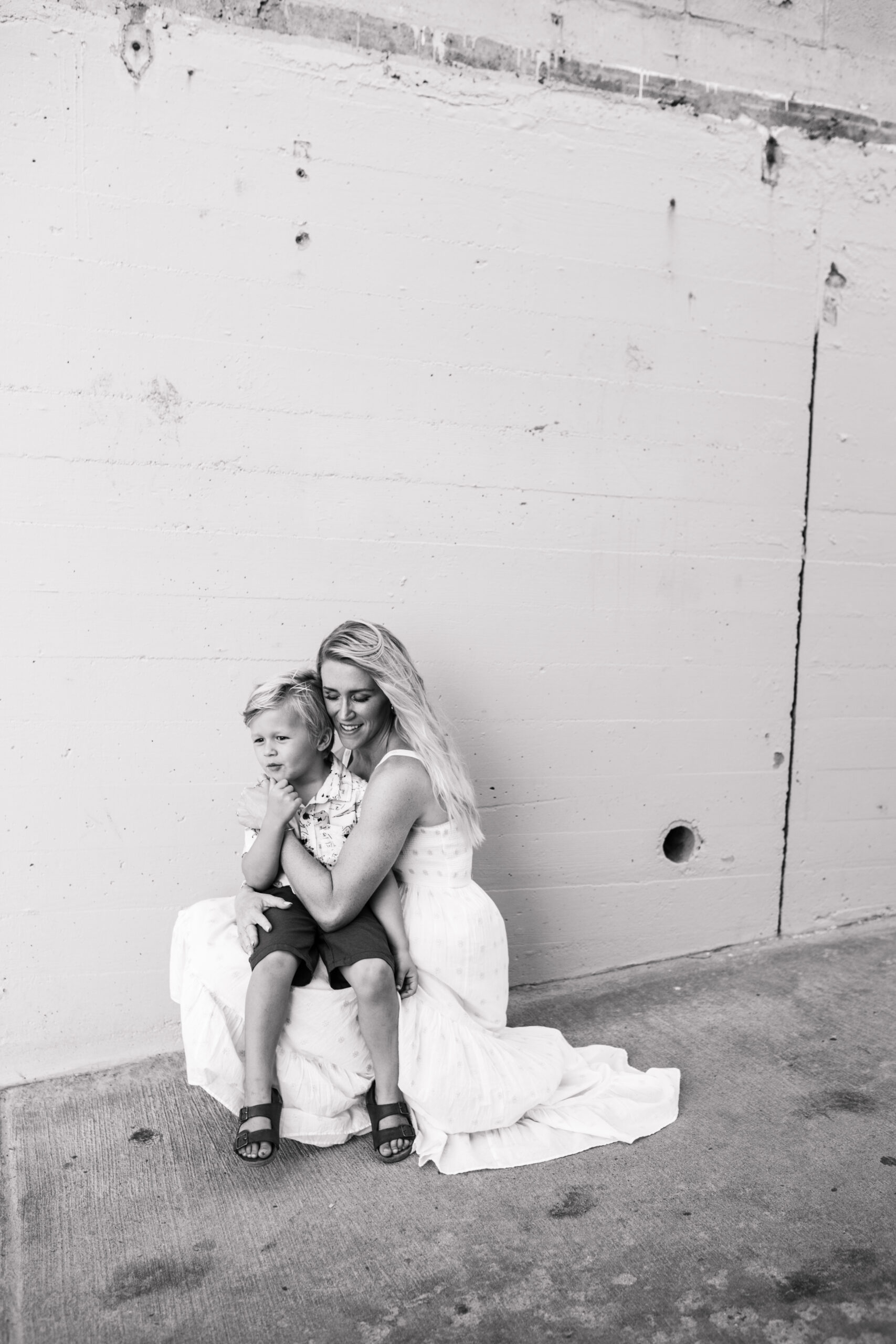 Family photos on the beach cool blue toned family photos San Diego photography family of four candid family moments family love beach family photos San Diego family photographer Sabrinalynnphoto