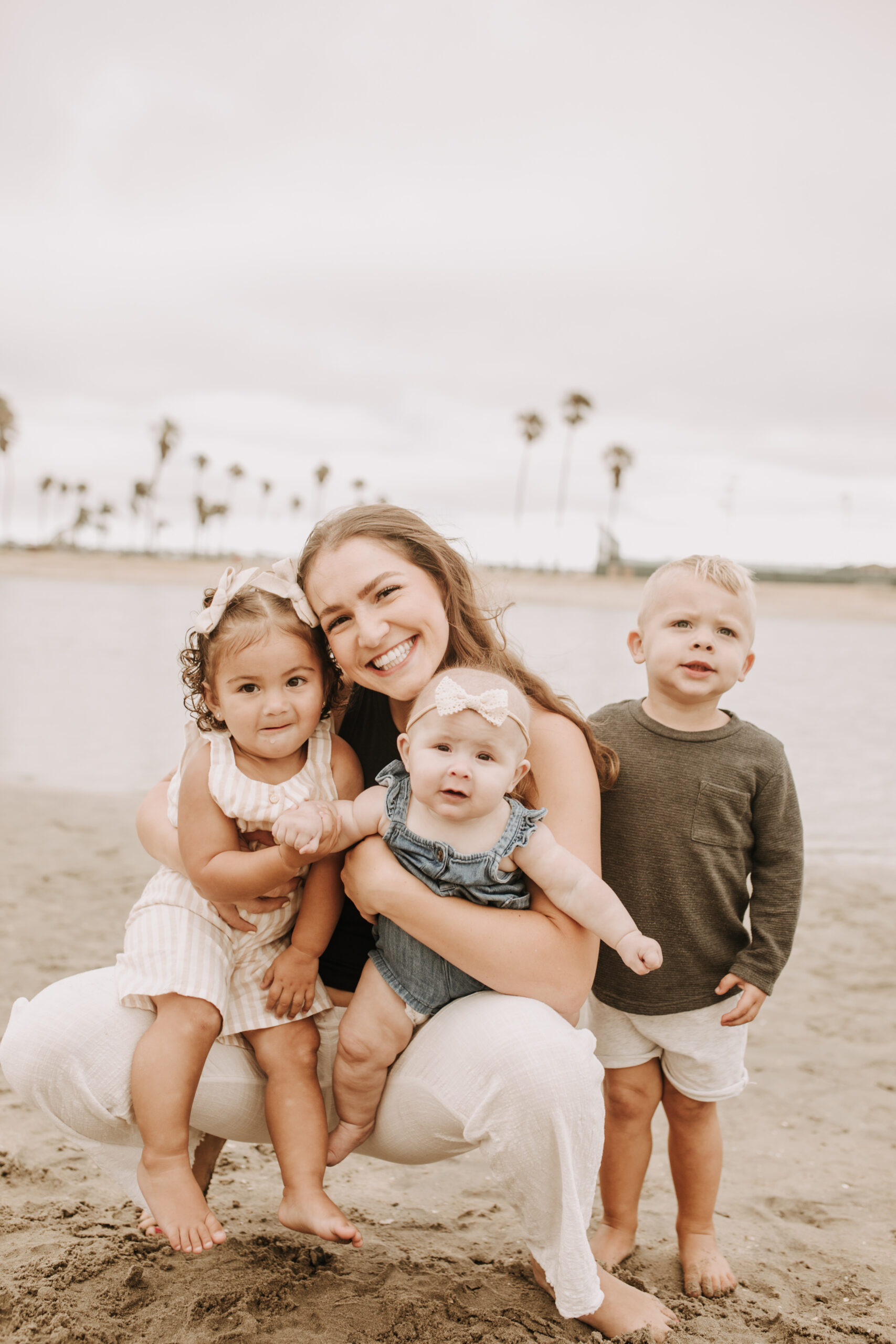 large family beach session family photos on the beach cloudy day big family great grand children San Diego family photographer