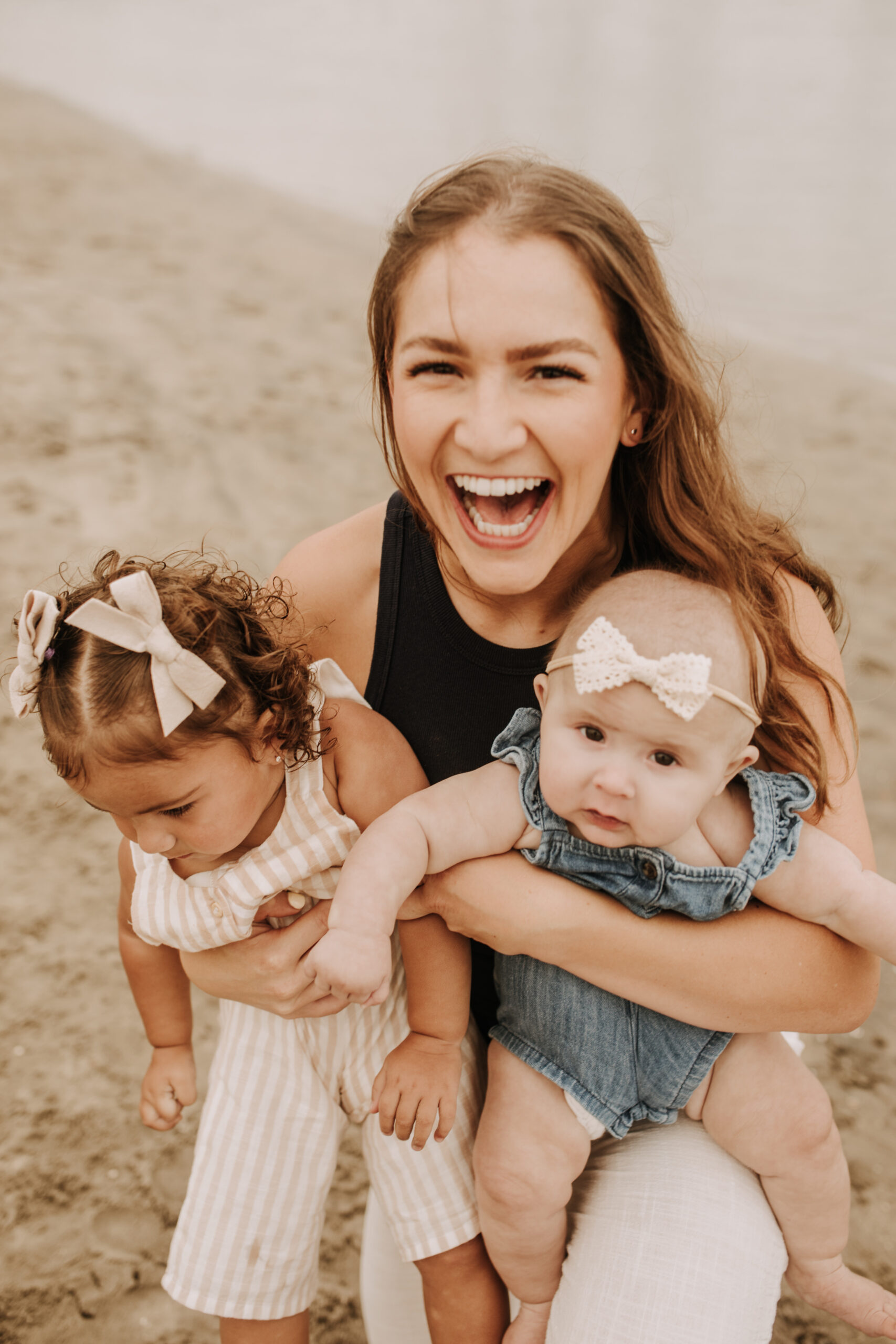 large family beach session family photos on the beach cloudy day big family great grand children San Diego family photographer