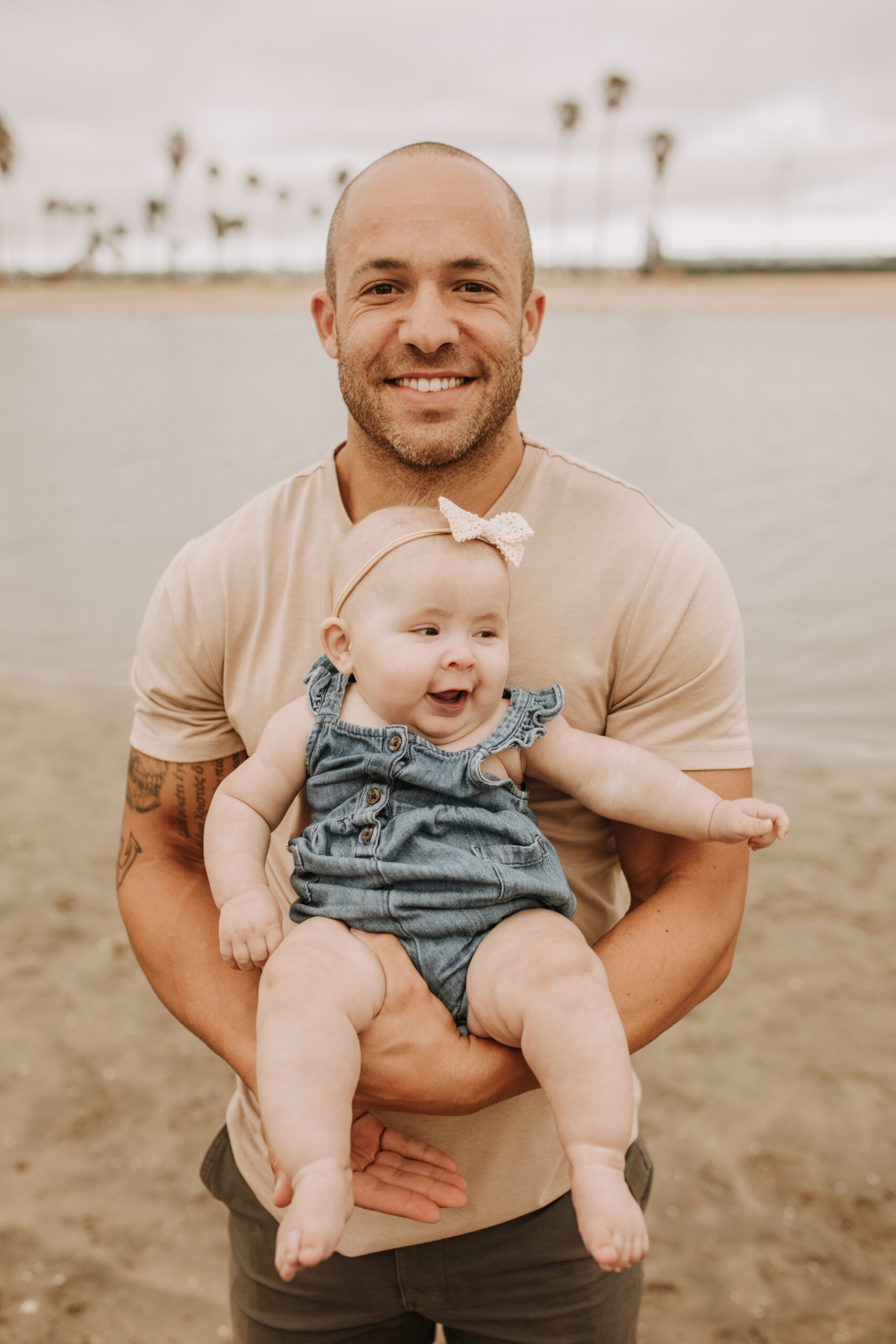 large family beach session family photos on the beach cloudy day big family great grand children San Diego family photographer