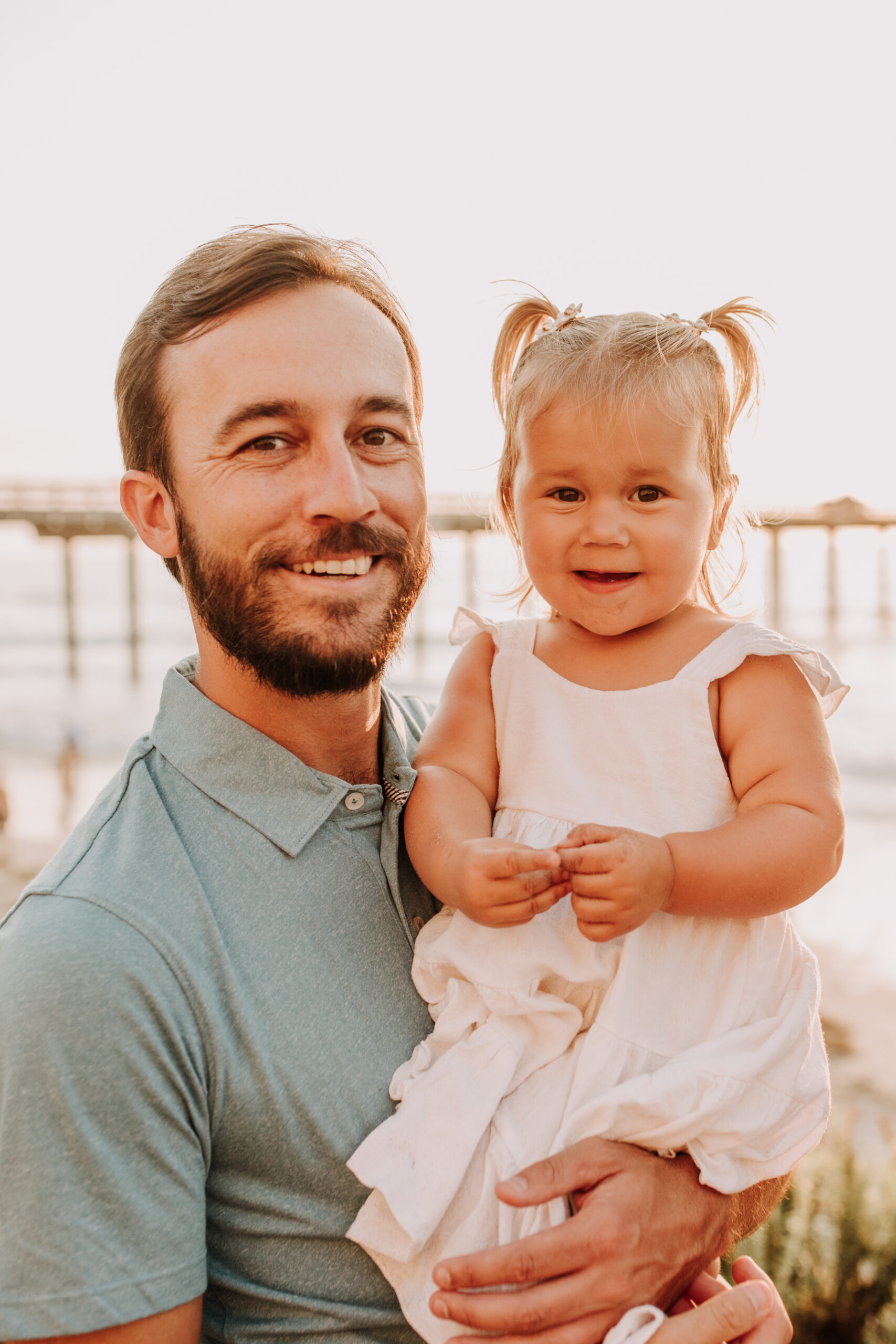 Family photos on the beach cool blue toned family photos San Diego photography family of four candid family moments family love beach family photos San Diego family photographer Sabrinalynnphoto