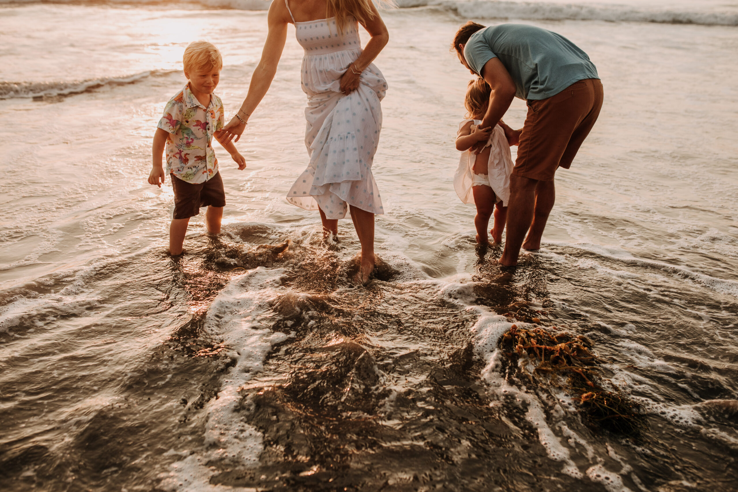 Family photos on the beach cool blue toned family photos San Diego photography family of four candid family moments family love beach family photos San Diego family photographer Sabrinalynnphoto